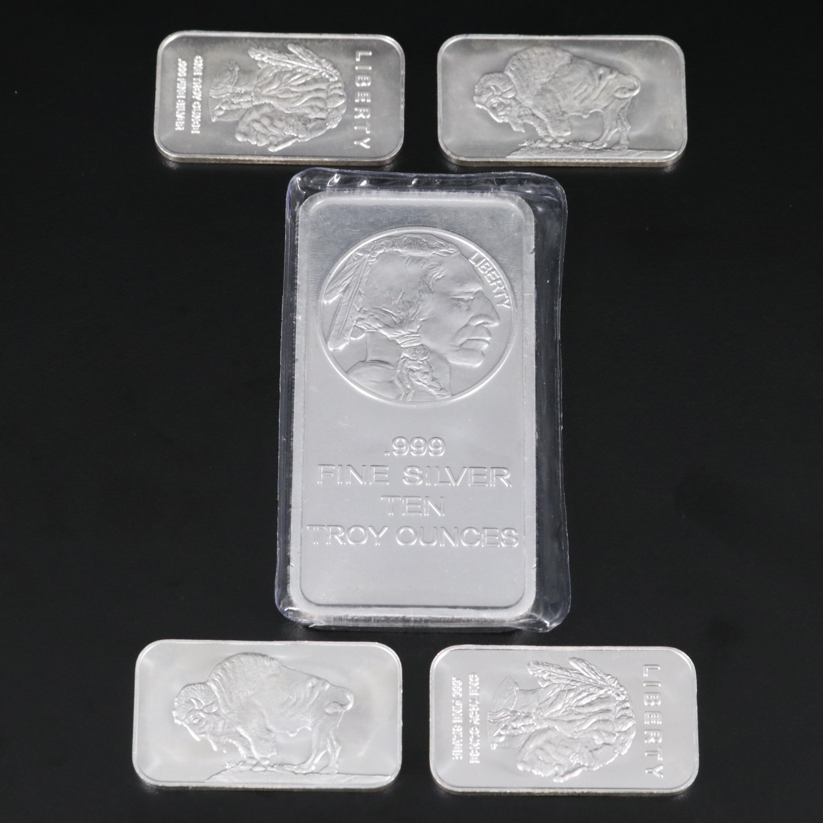 A Ten Troy Ounce and Four One Troy Ounce .999 Silver Bars
