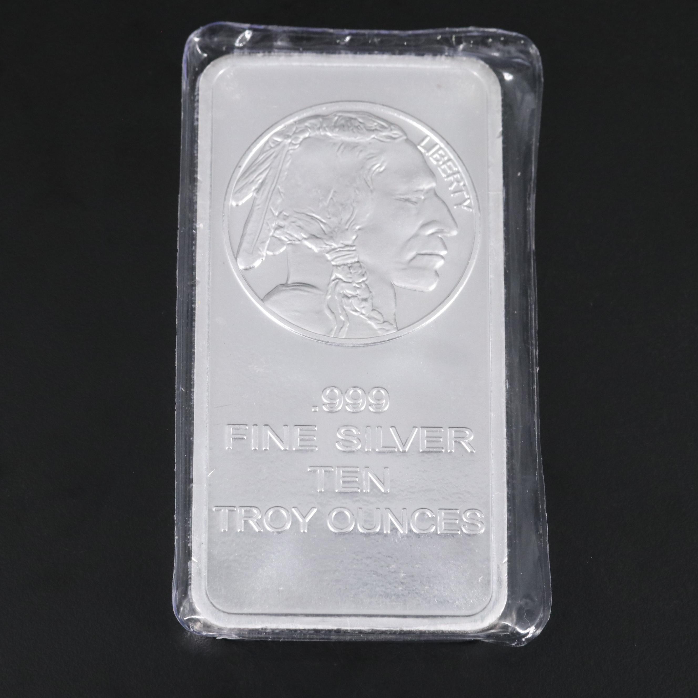 A Ten Troy Ounce and Four One Troy Ounce .999 Silver Bars