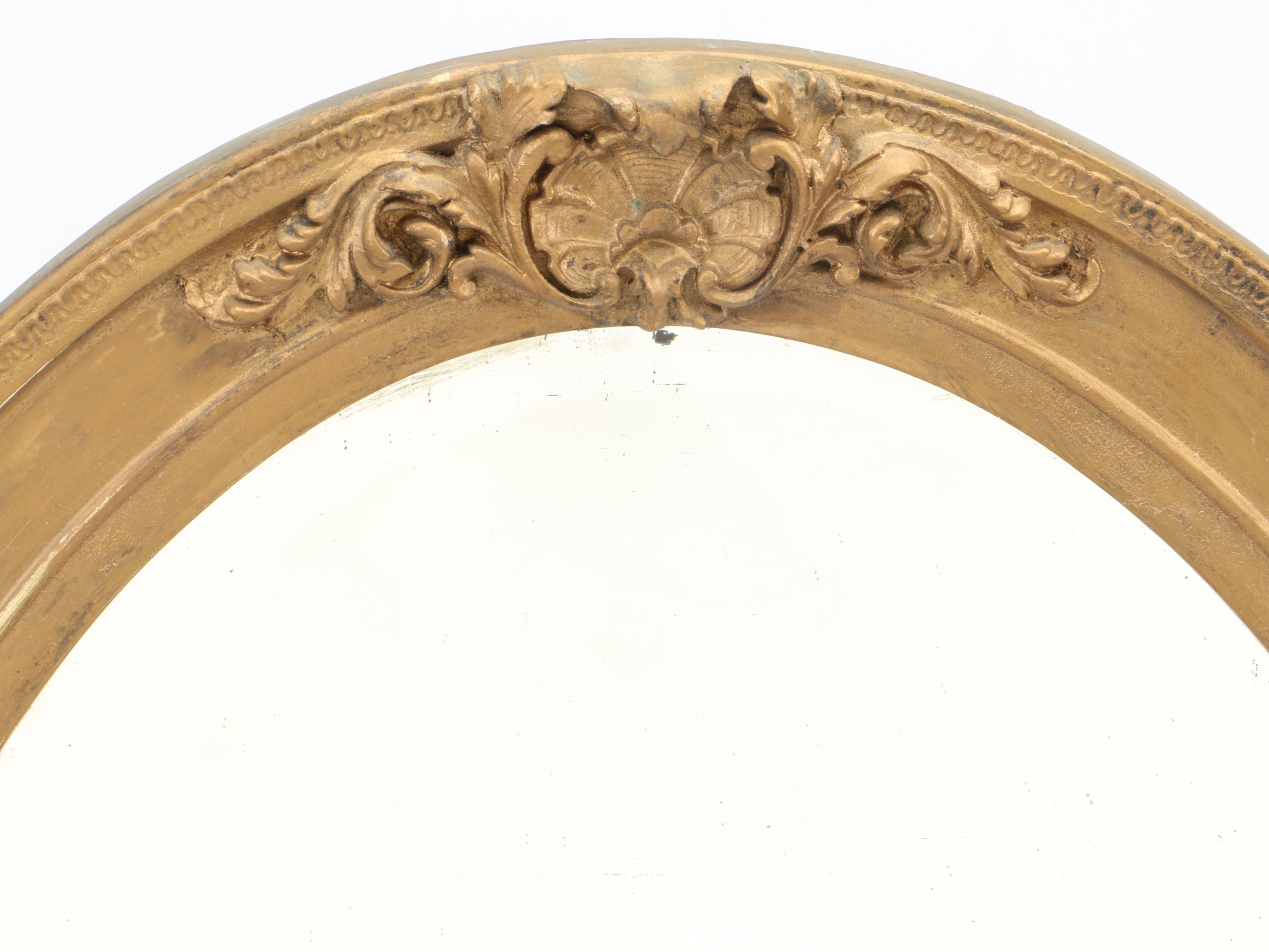 Beveled Glass Oval Mirror in Gilt Gesso Frame