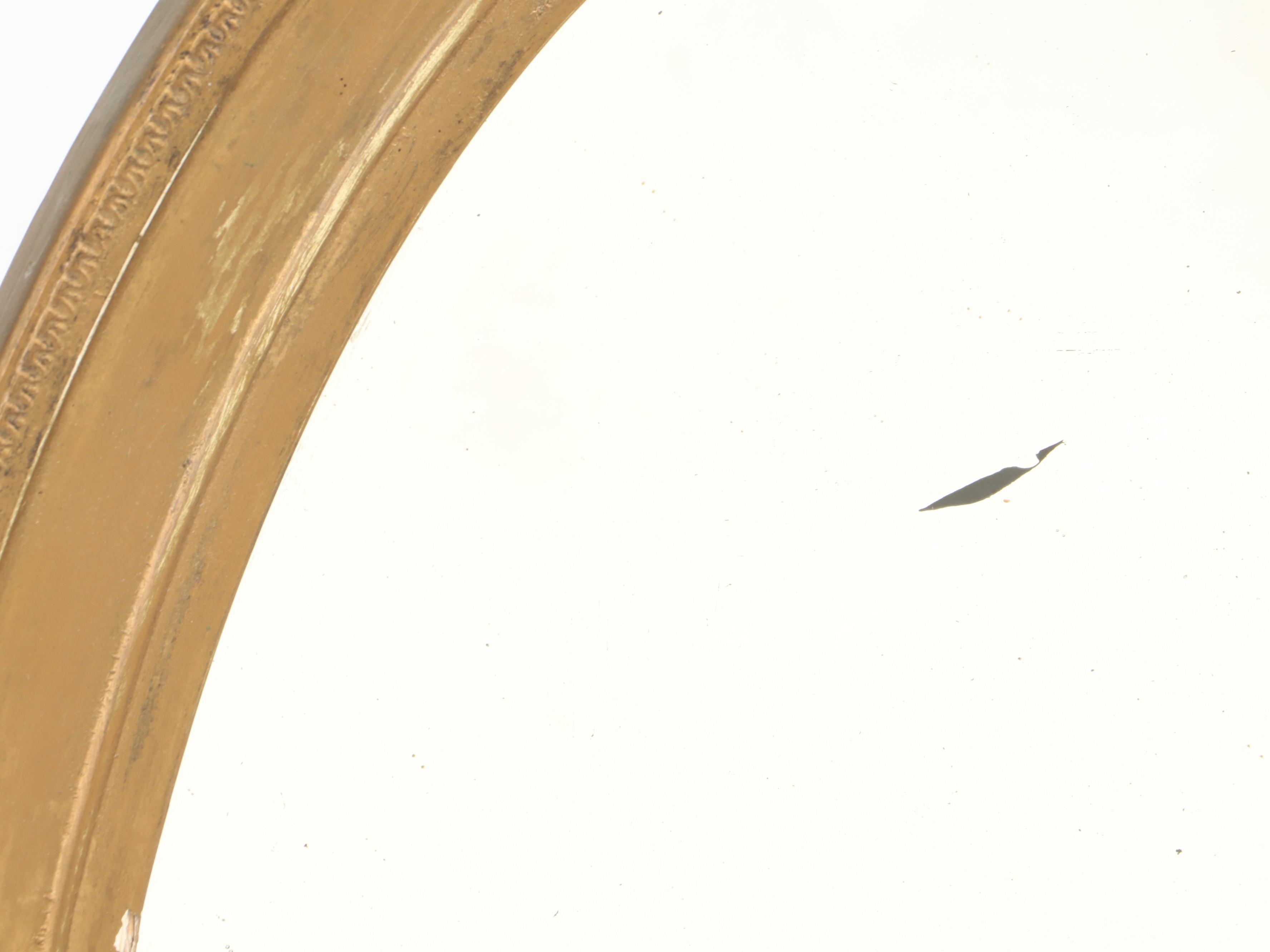 Beveled Glass Oval Mirror in Gilt Gesso Frame