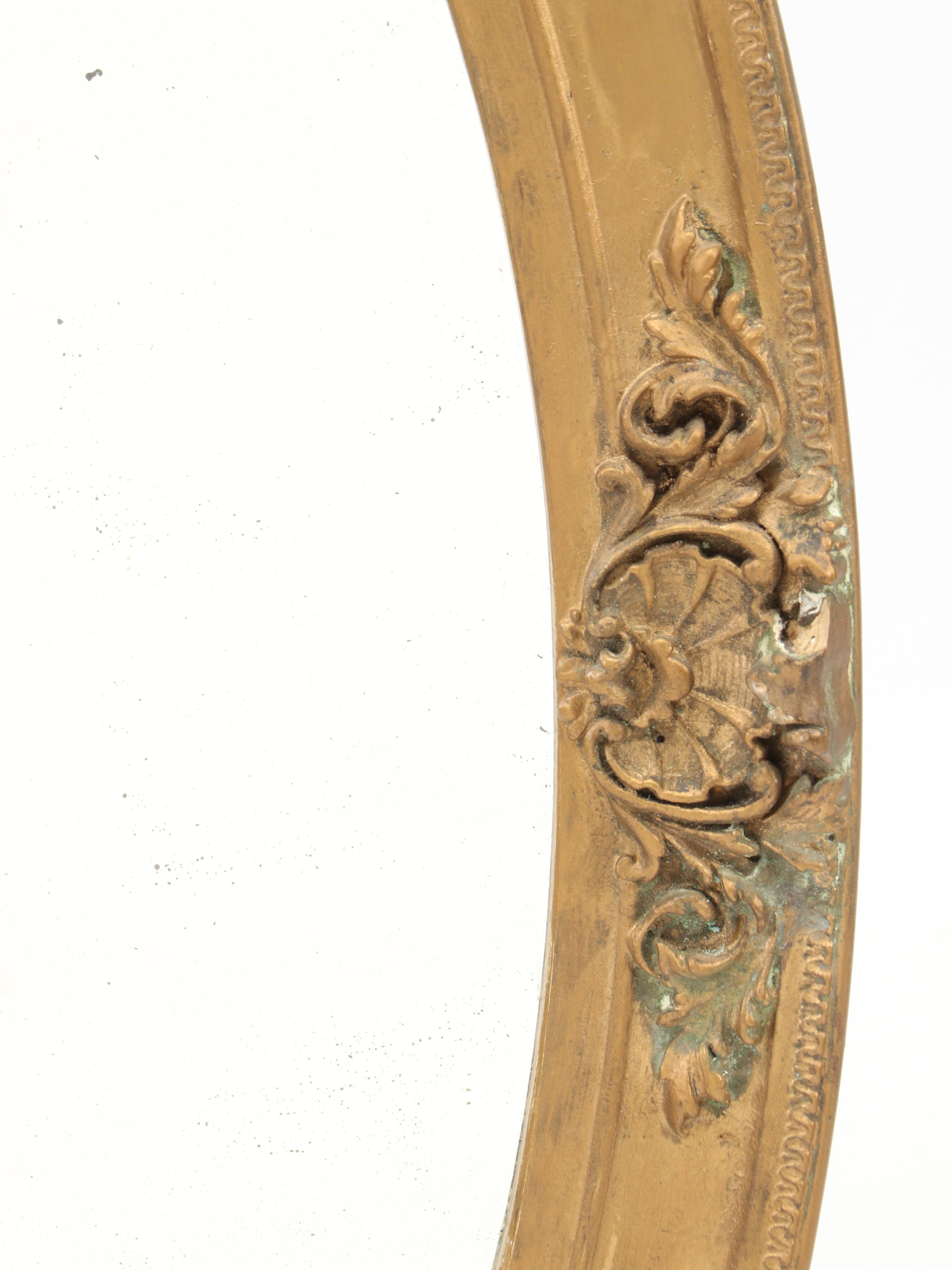 Beveled Glass Oval Mirror in Gilt Gesso Frame