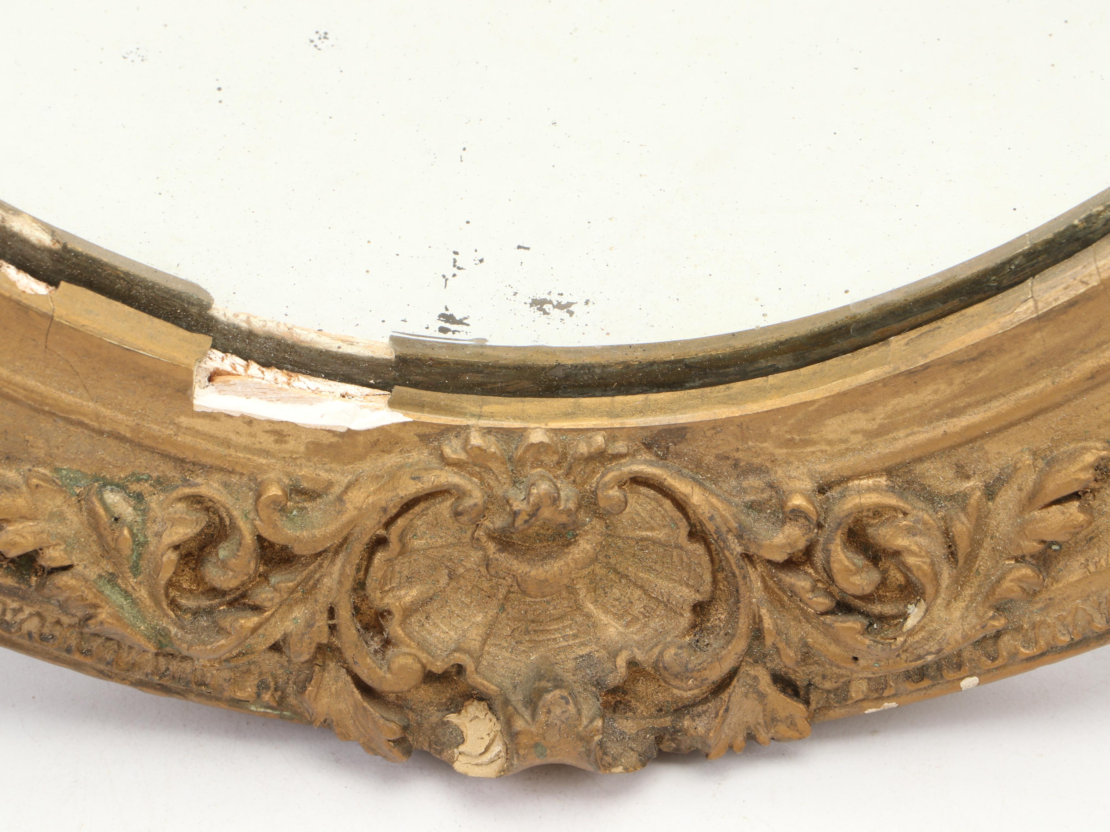 Beveled Glass Oval Mirror in Gilt Gesso Frame