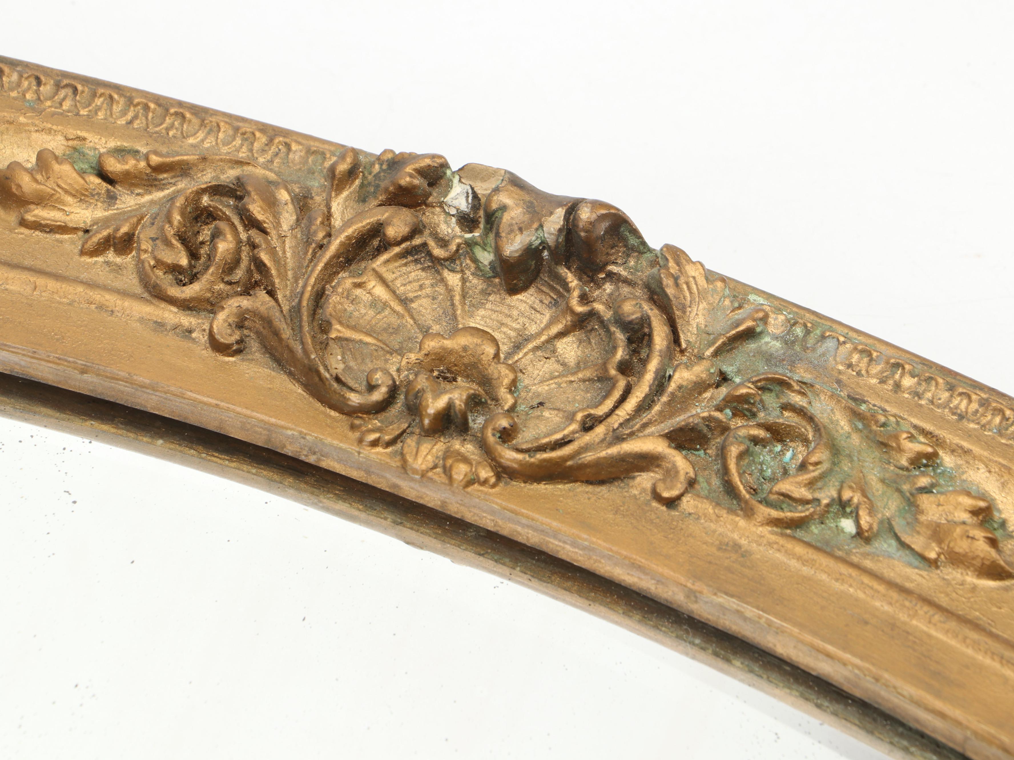 Beveled Glass Oval Mirror in Gilt Gesso Frame