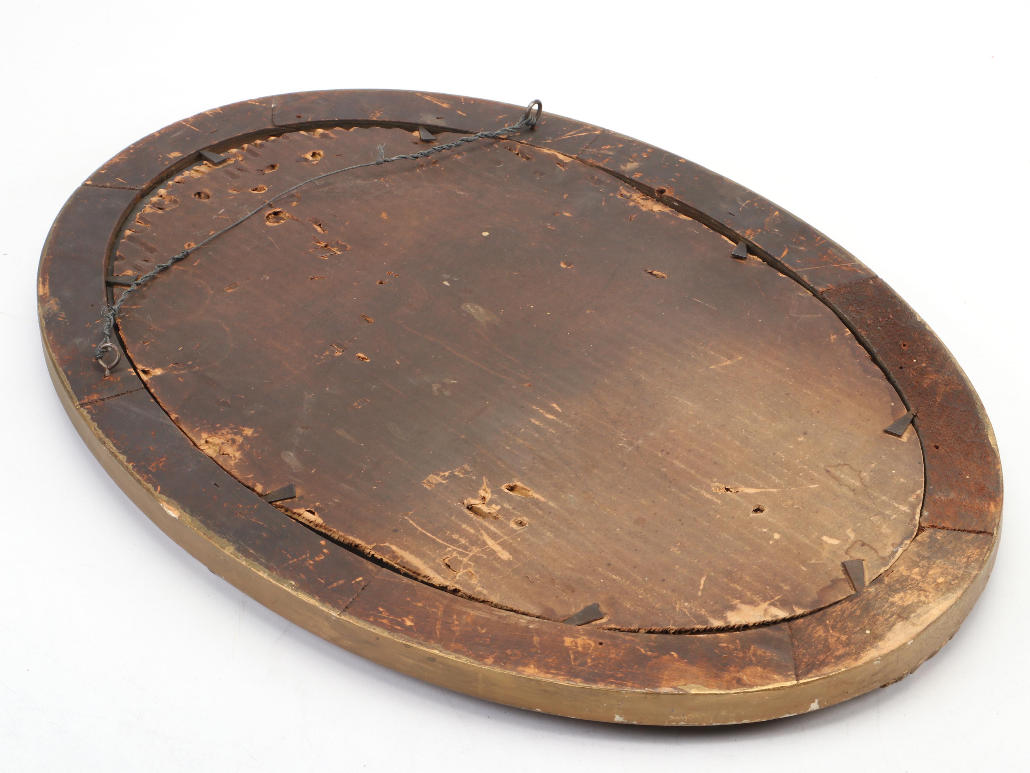 Beveled Glass Oval Mirror in Gilt Gesso Frame