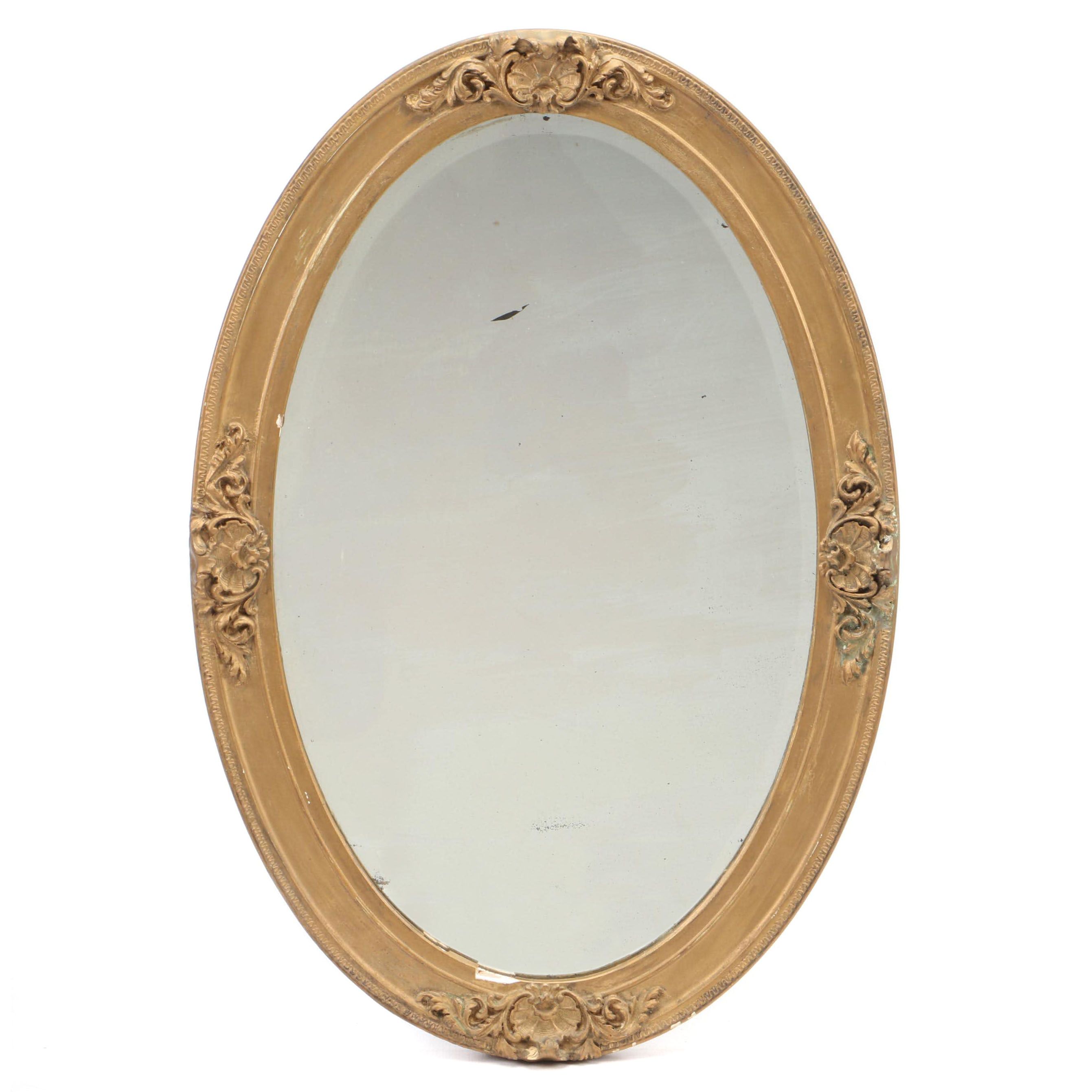 Beveled Glass Oval Mirror in Gilt Gesso Frame