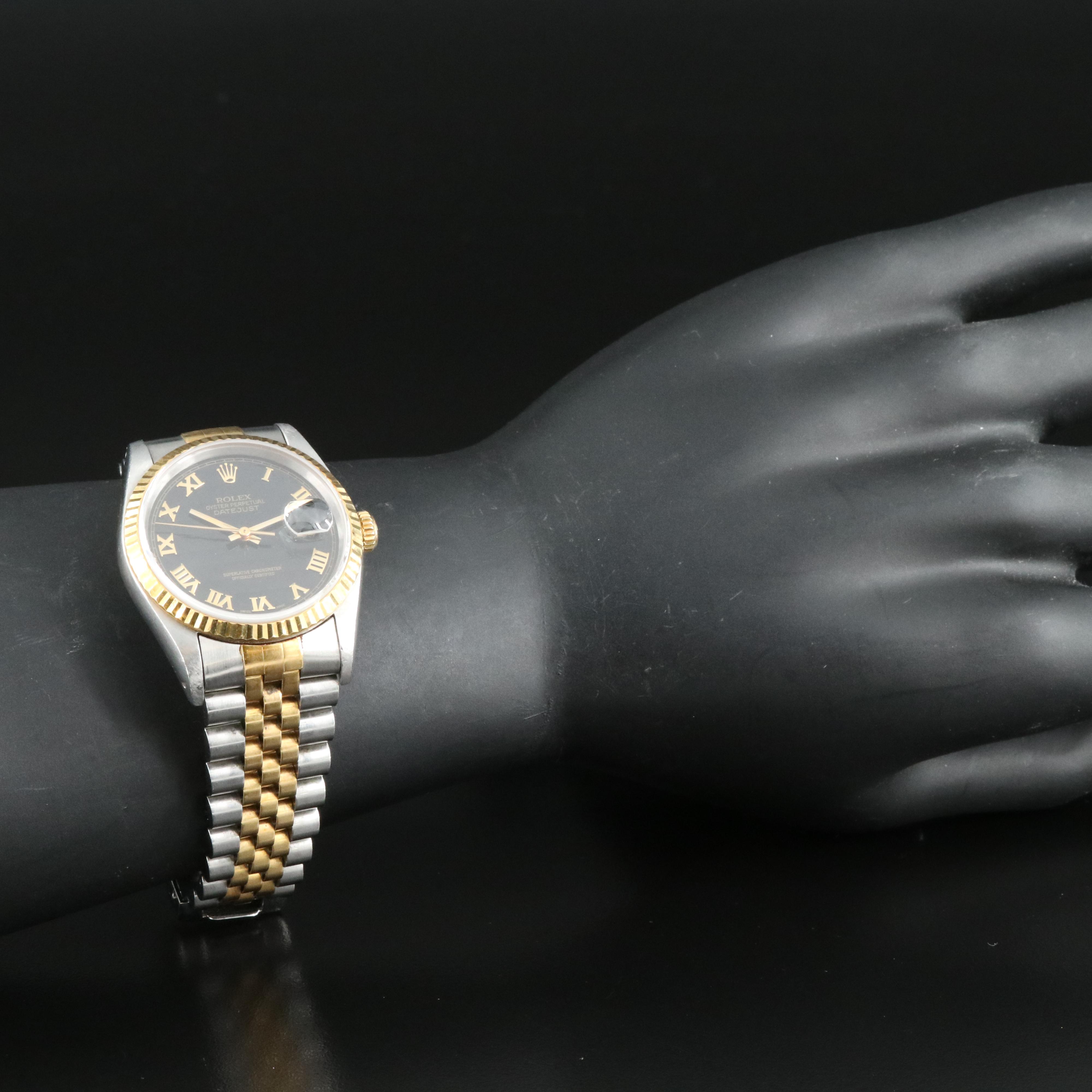 1991 Rolex Black Pyramid Roman Dial Datejust Watch