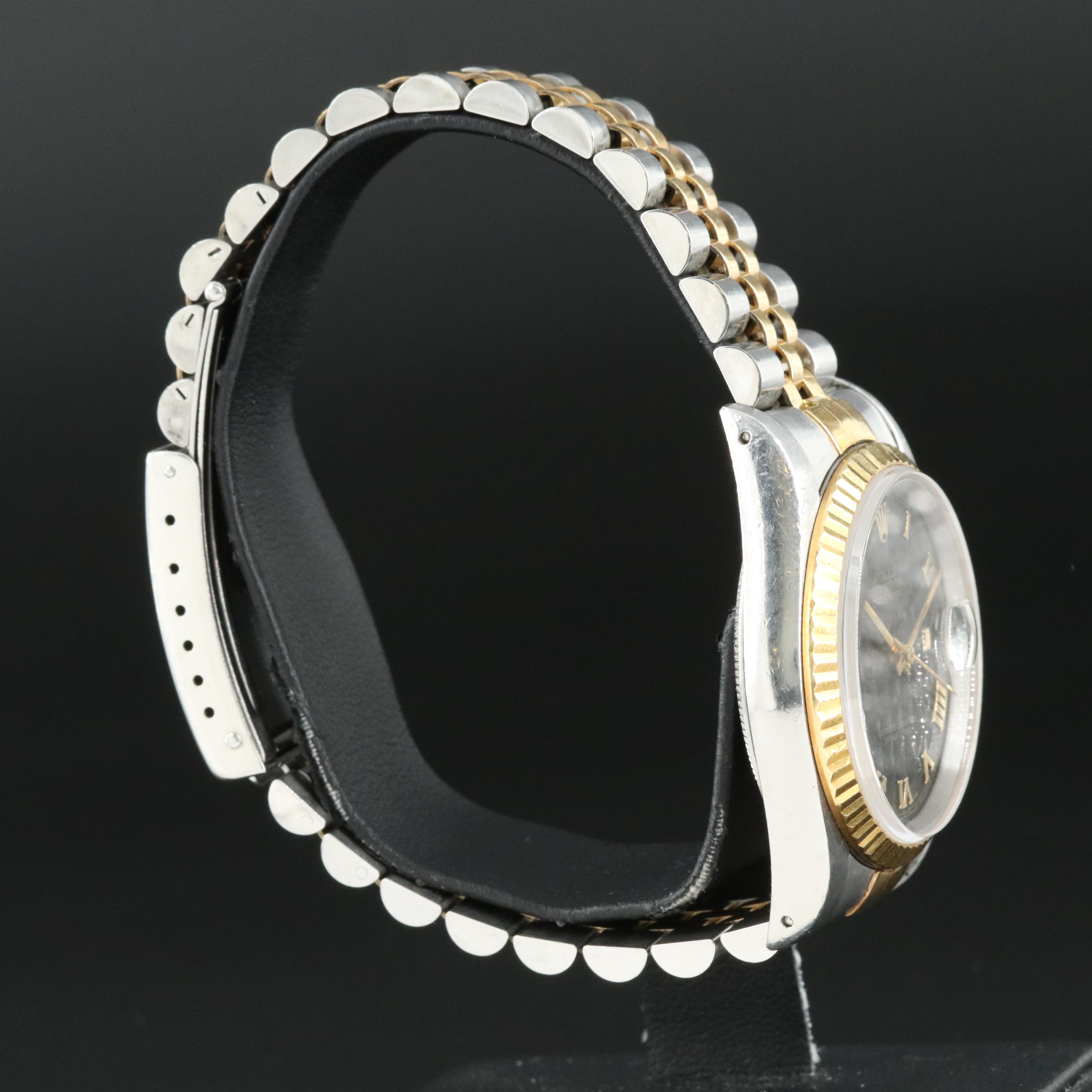 1991 Rolex Black Pyramid Roman Dial Datejust Watch