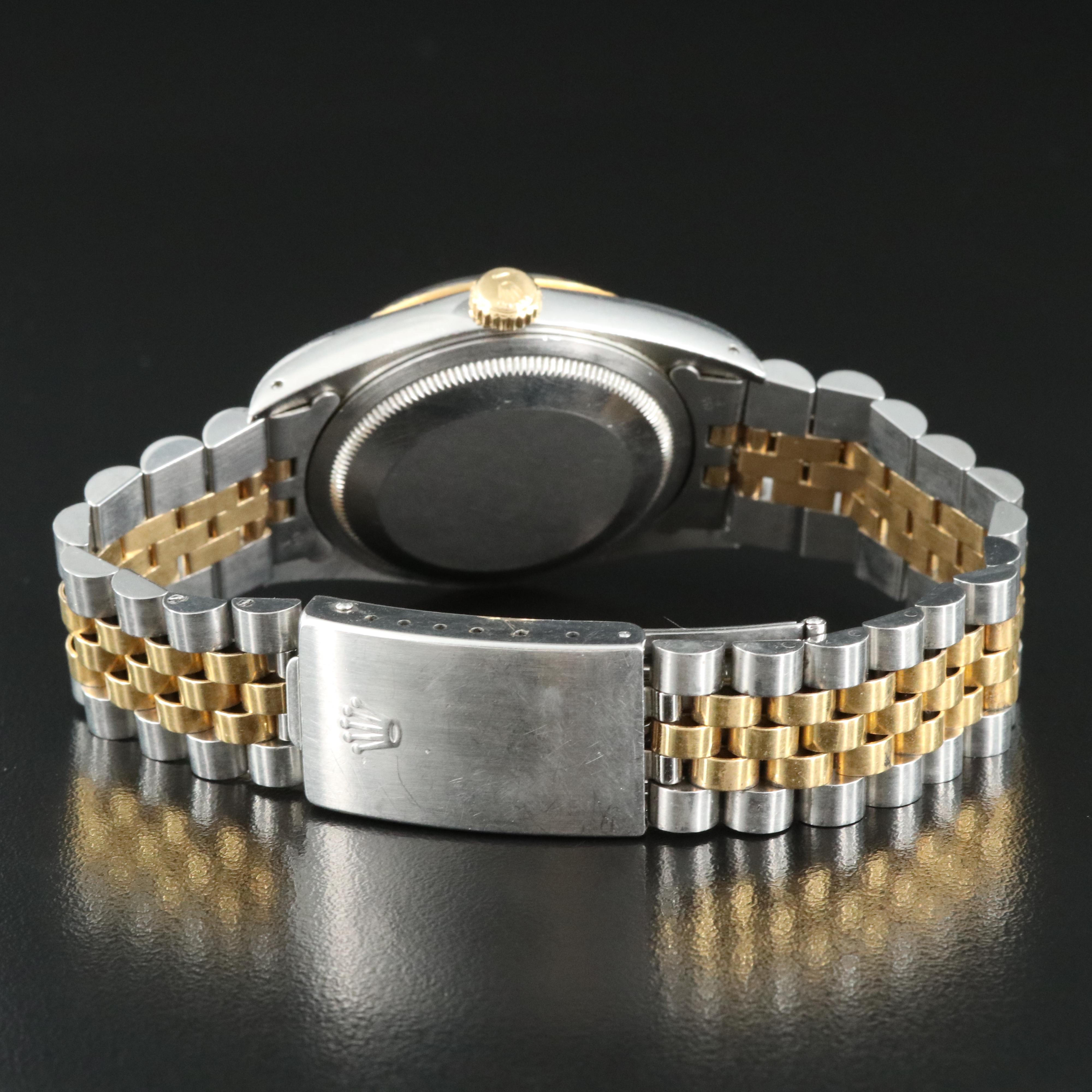 1991 Rolex Black Pyramid Roman Dial Datejust Watch