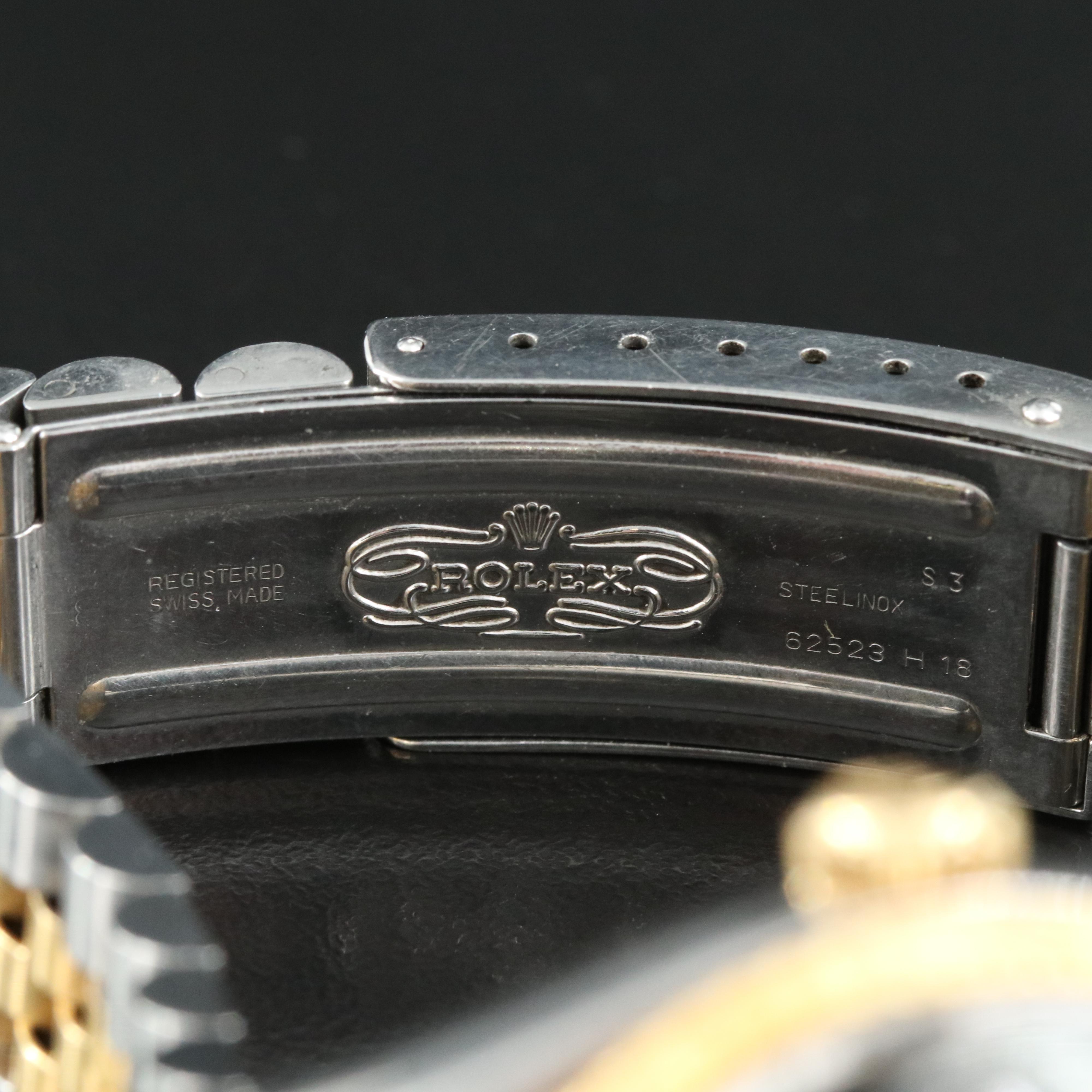 1991 Rolex Black Pyramid Roman Dial Datejust Watch