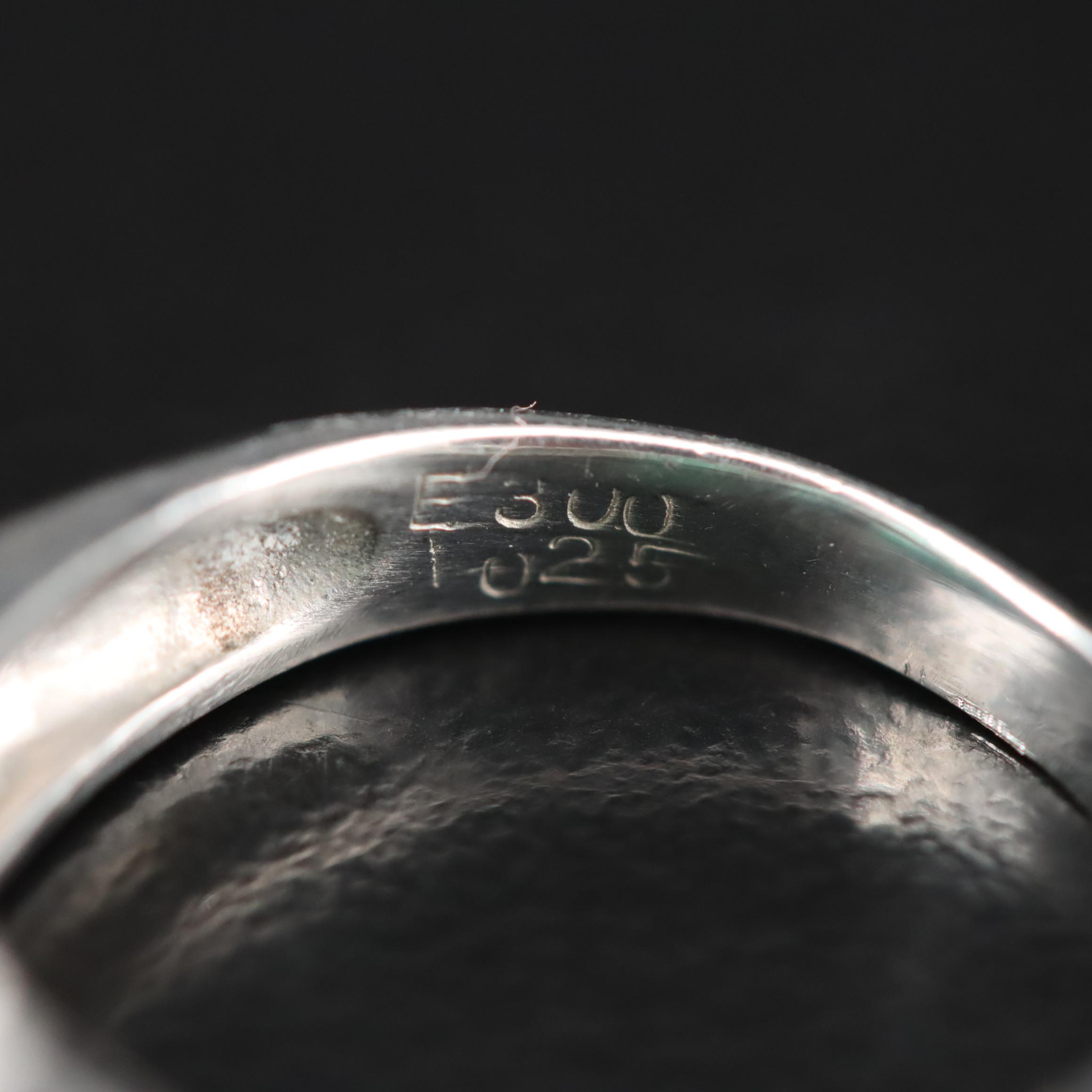 Platinum Emerald and Diamond Ring