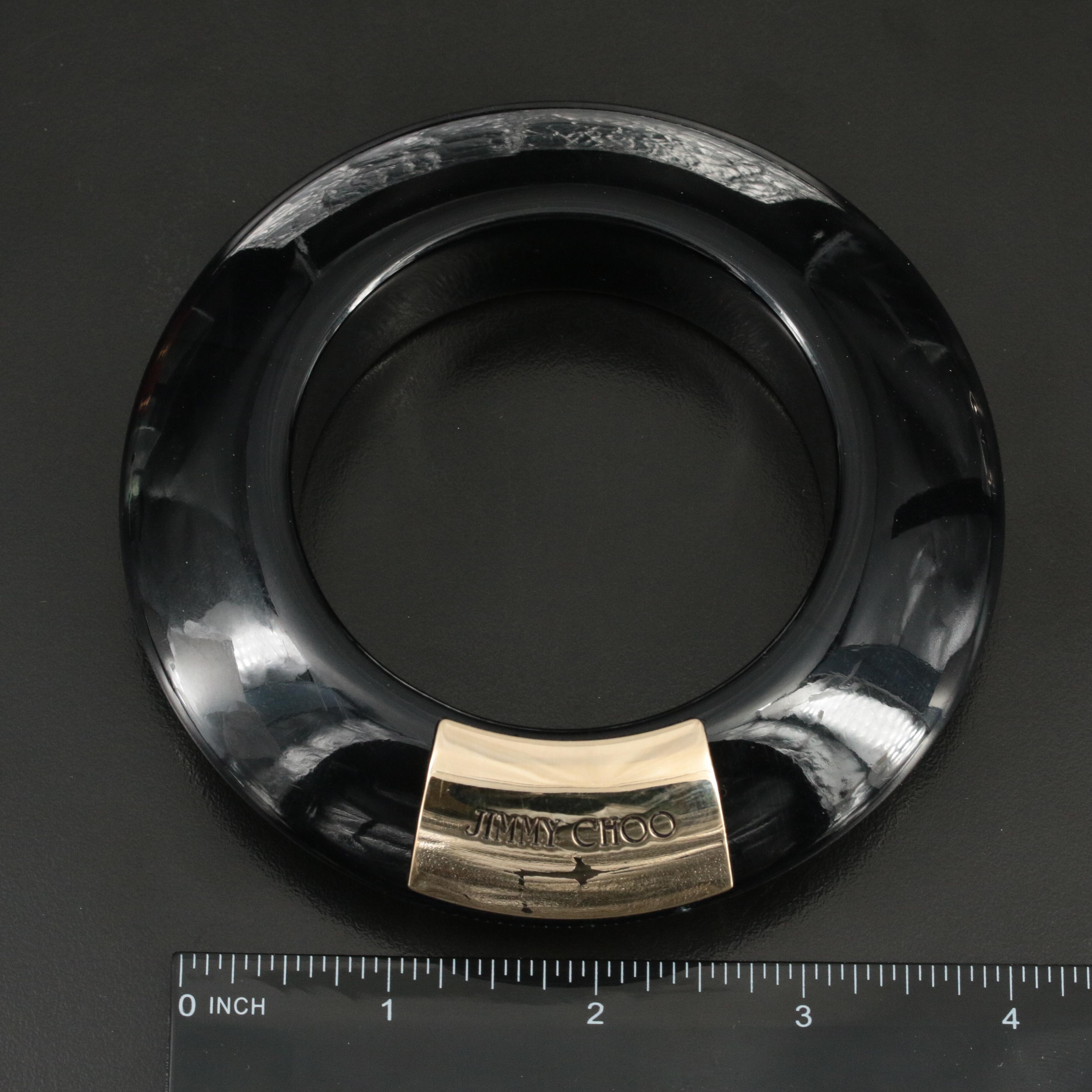 Balenciaga 'Arena', Jimmy Choo, and Tory Burch Bracelets