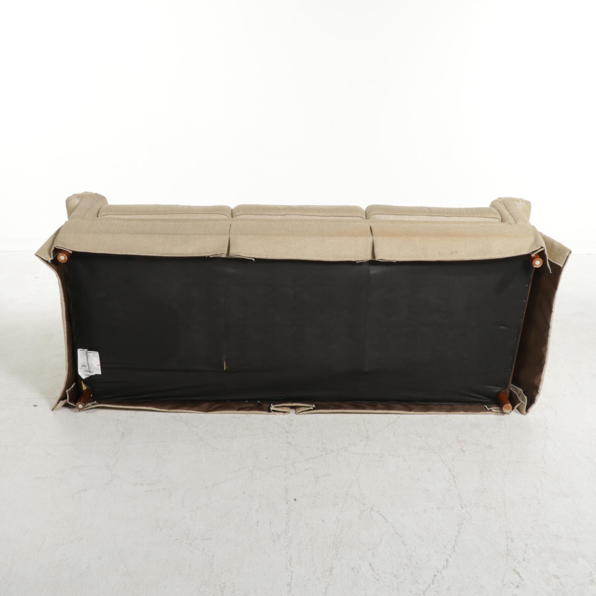 Broyhill Skirted and Roll Arm Three-Seat Sofa