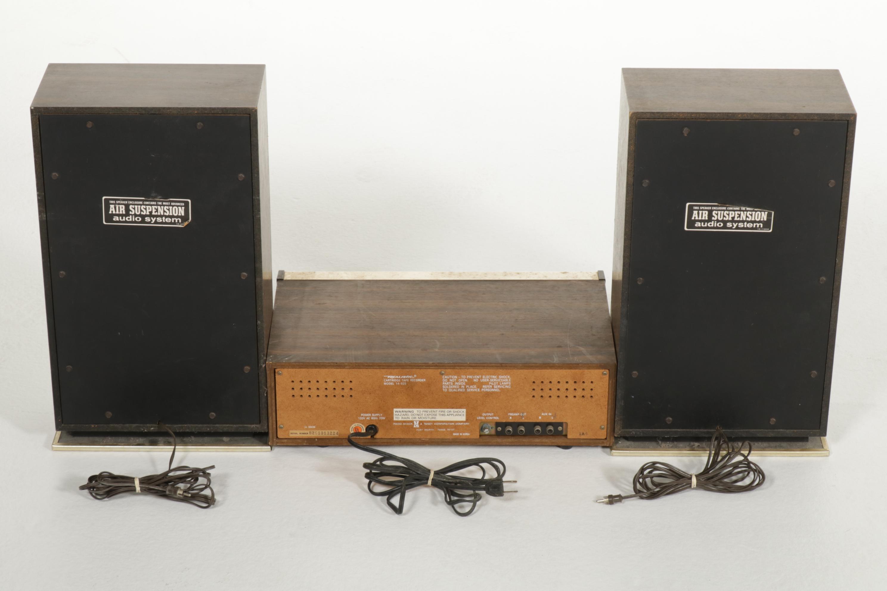 Realistic Stereo 8-Track Player, Air Suspension Speakers, and Vinyl Records