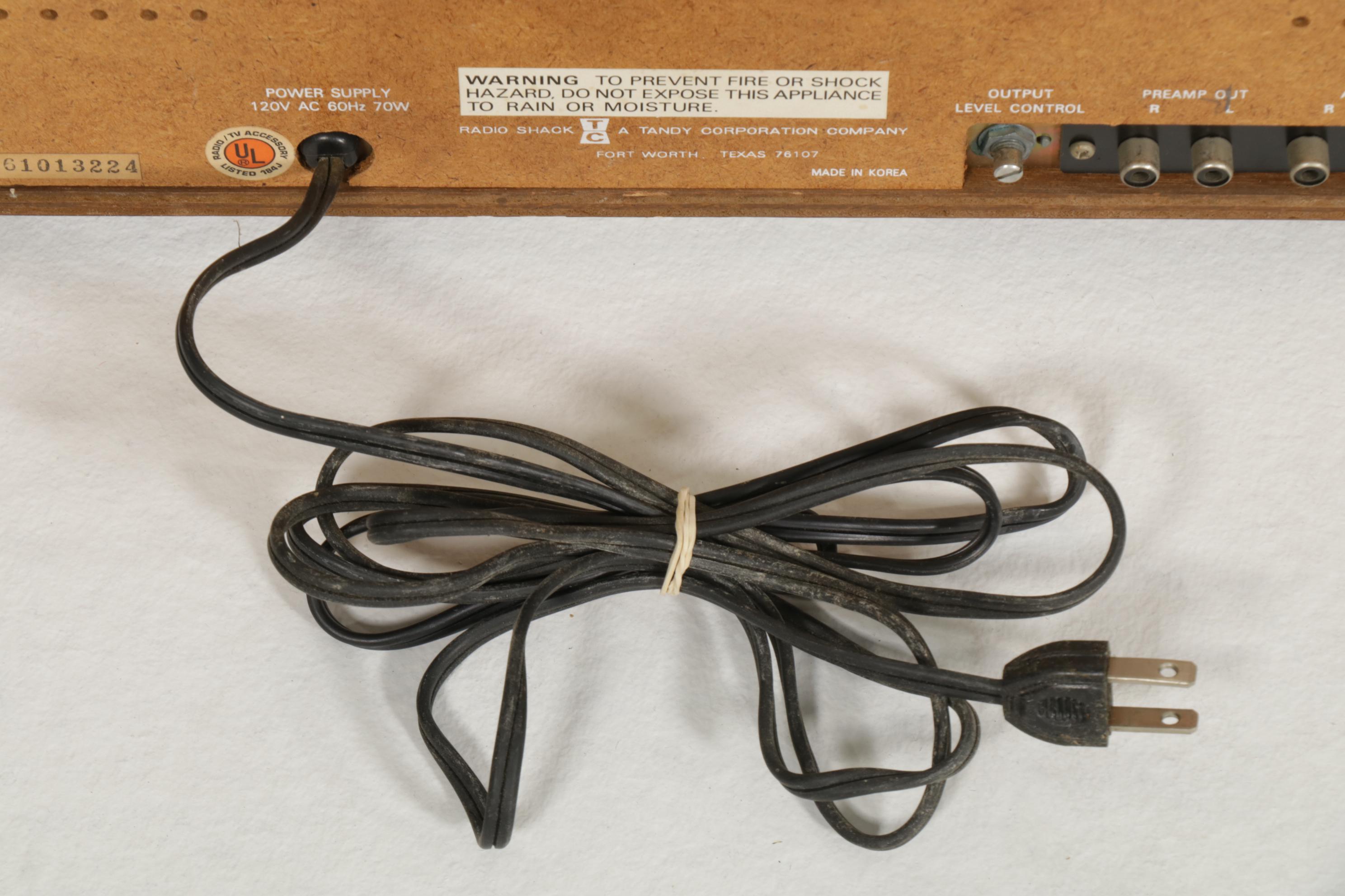 Realistic Stereo 8-Track Player, Air Suspension Speakers, and Vinyl Records