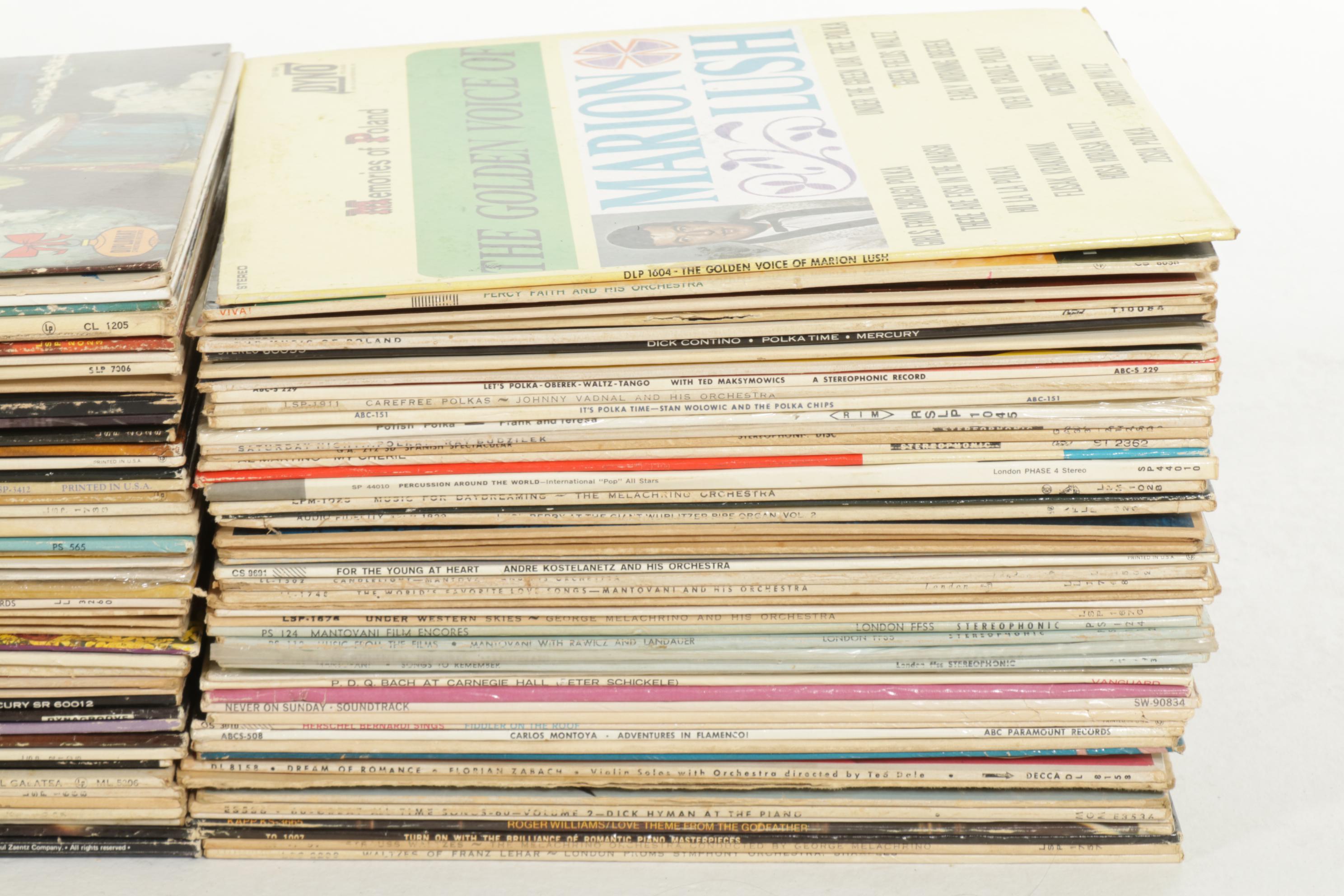 Realistic Stereo 8-Track Player, Air Suspension Speakers, and Vinyl Records