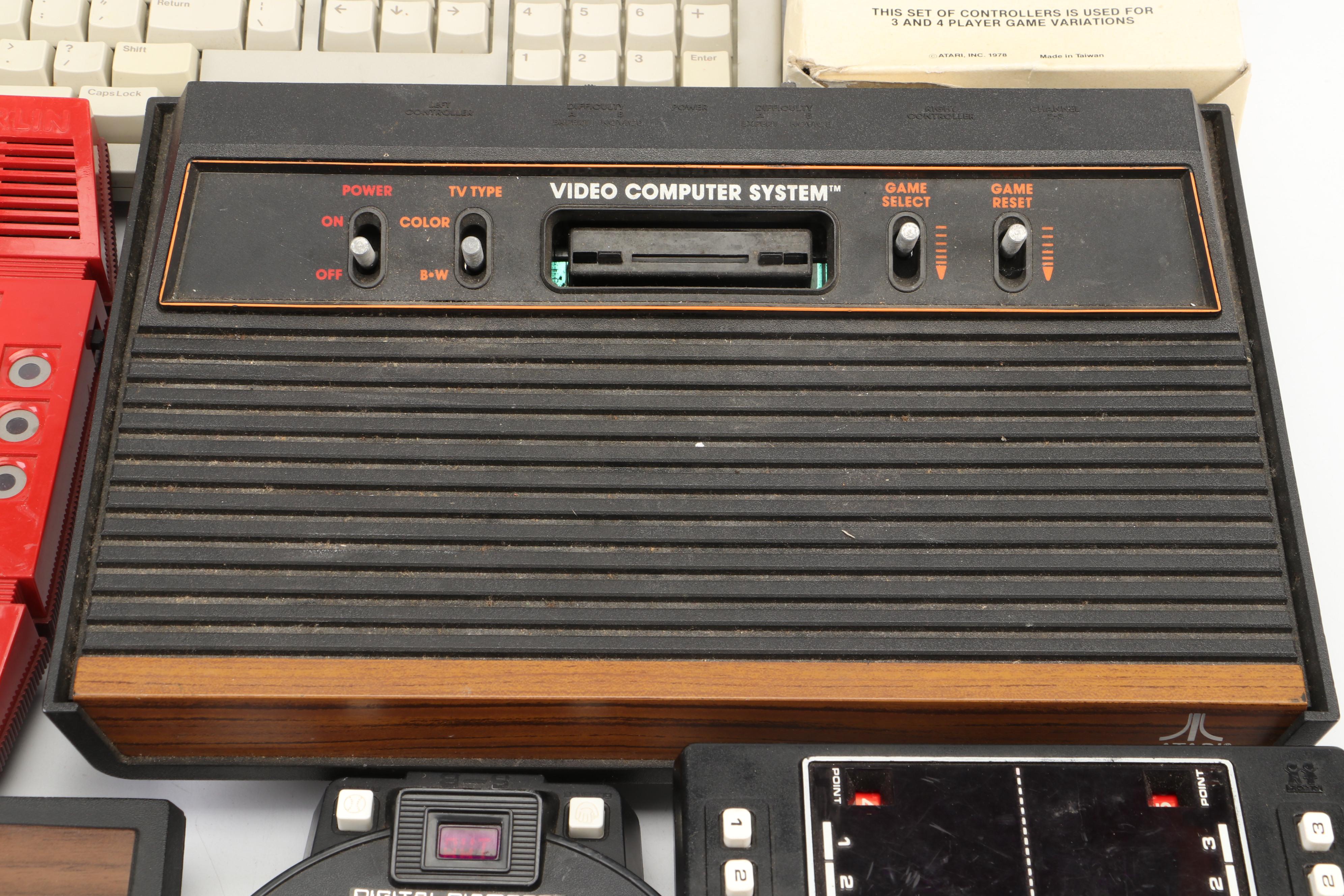 Atari 2600 Console with Video Games, Controllers, and More