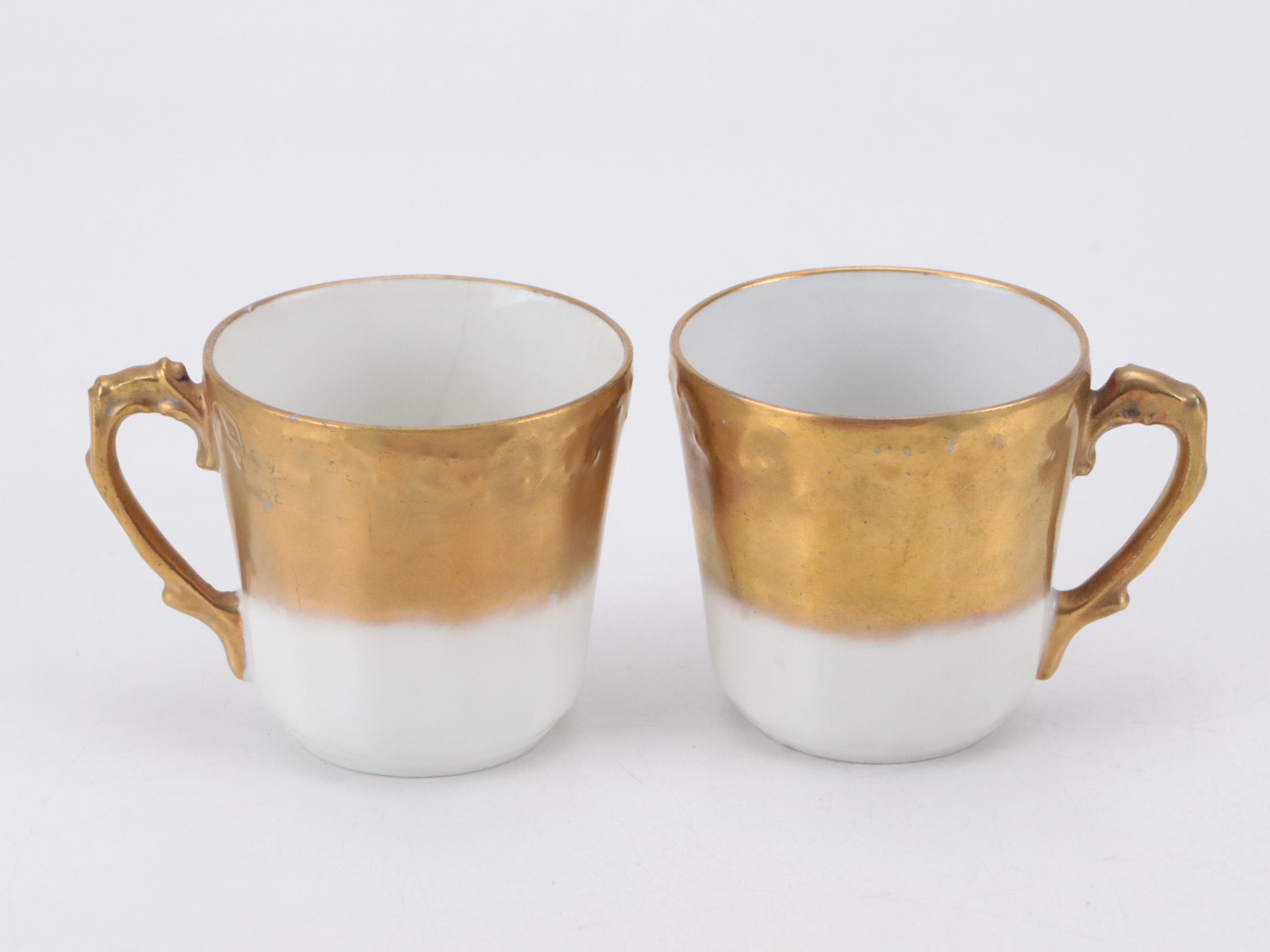 Coiffe Limoges Gilt Porcelain Dinnerware, Early 20th Century