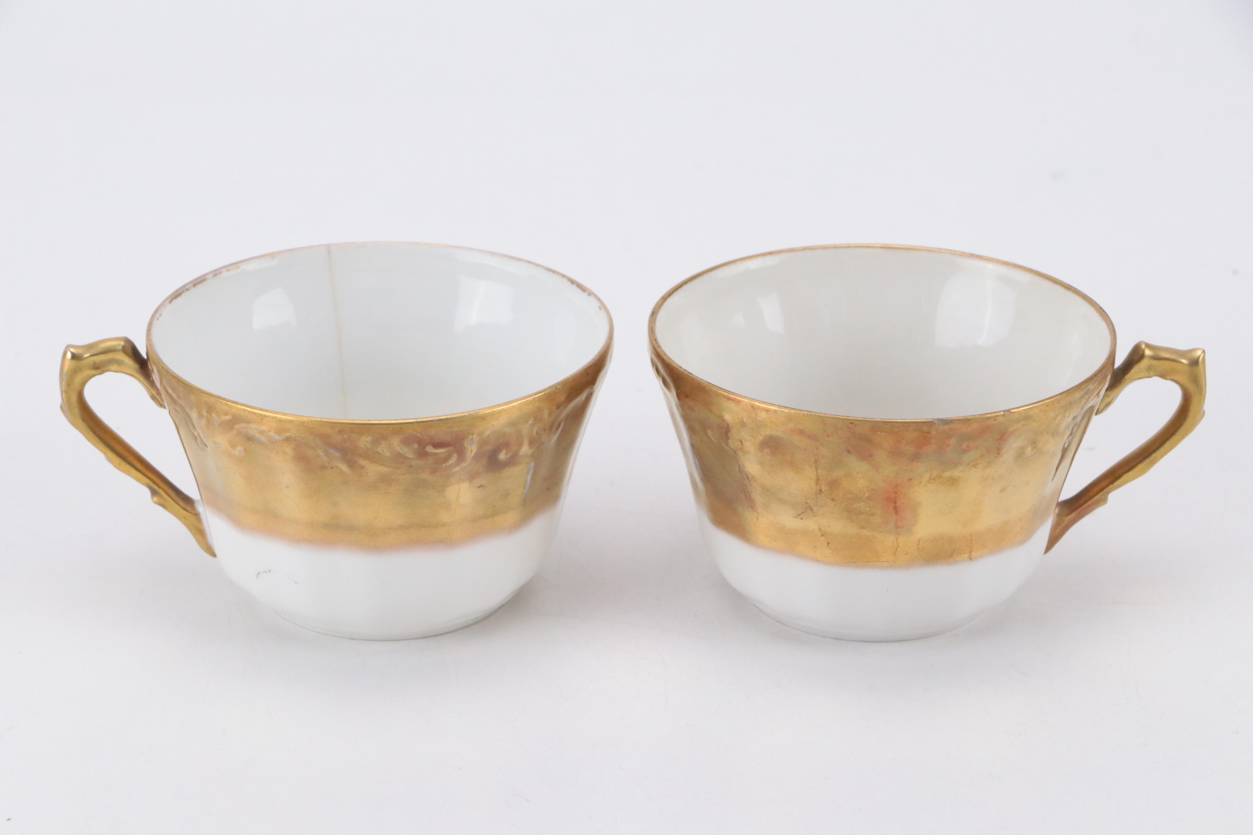 Coiffe Limoges Gilt Porcelain Dinnerware, Early 20th Century