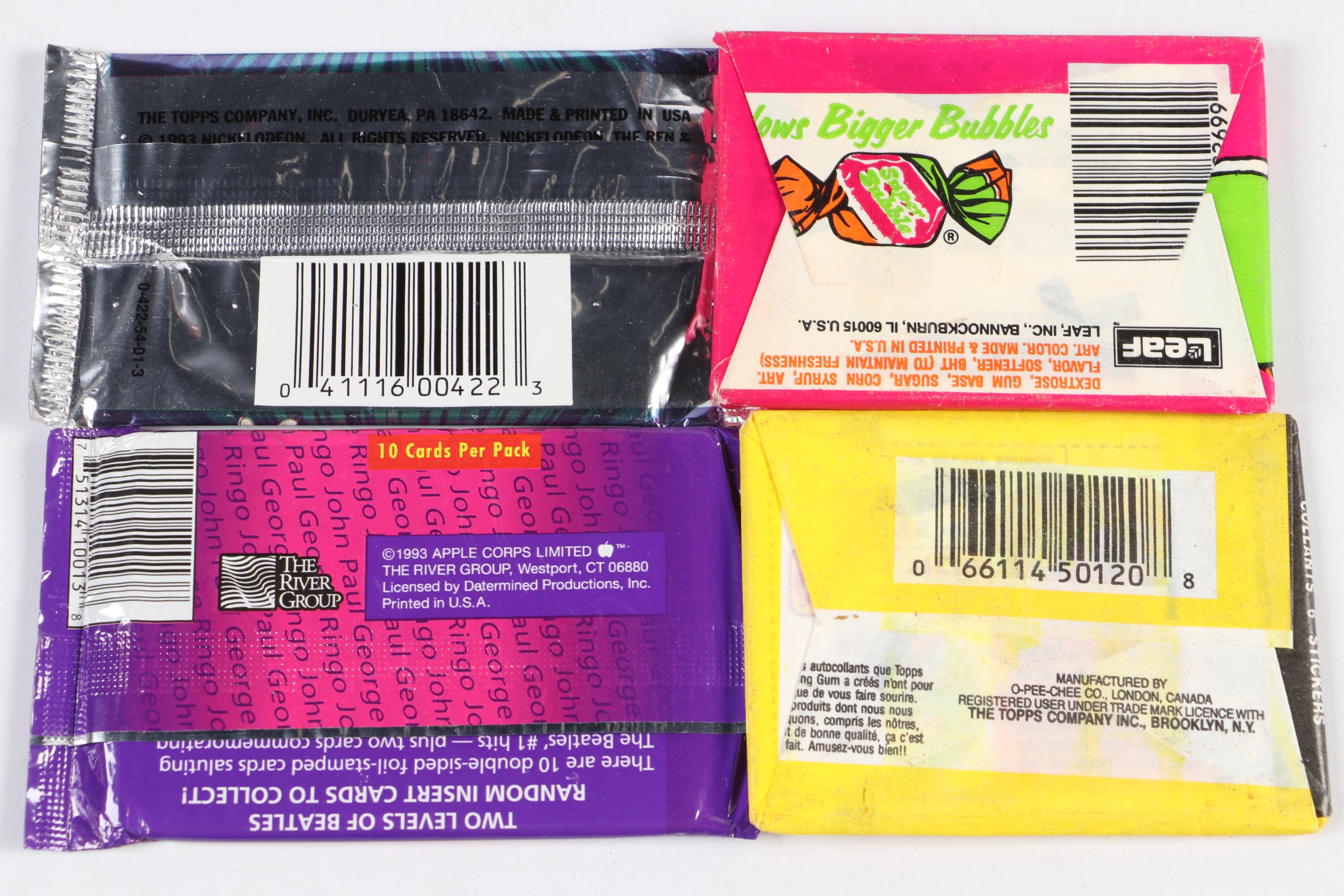 Sealed Trading Card Packs Featuring "The Beatles", "Spider-Man", and More