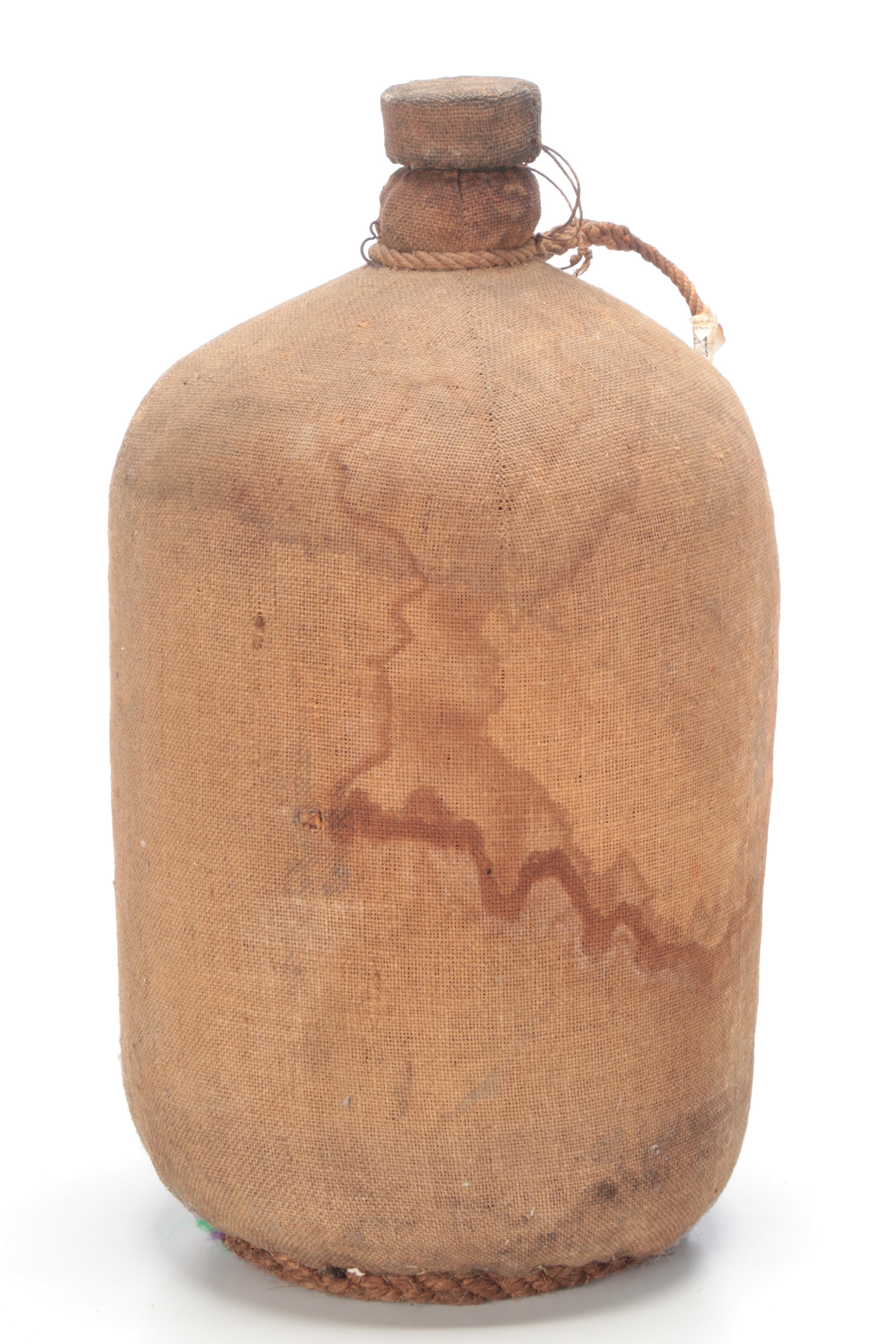 Burlap Covered Stoneware Water Jug with Wooden Platform