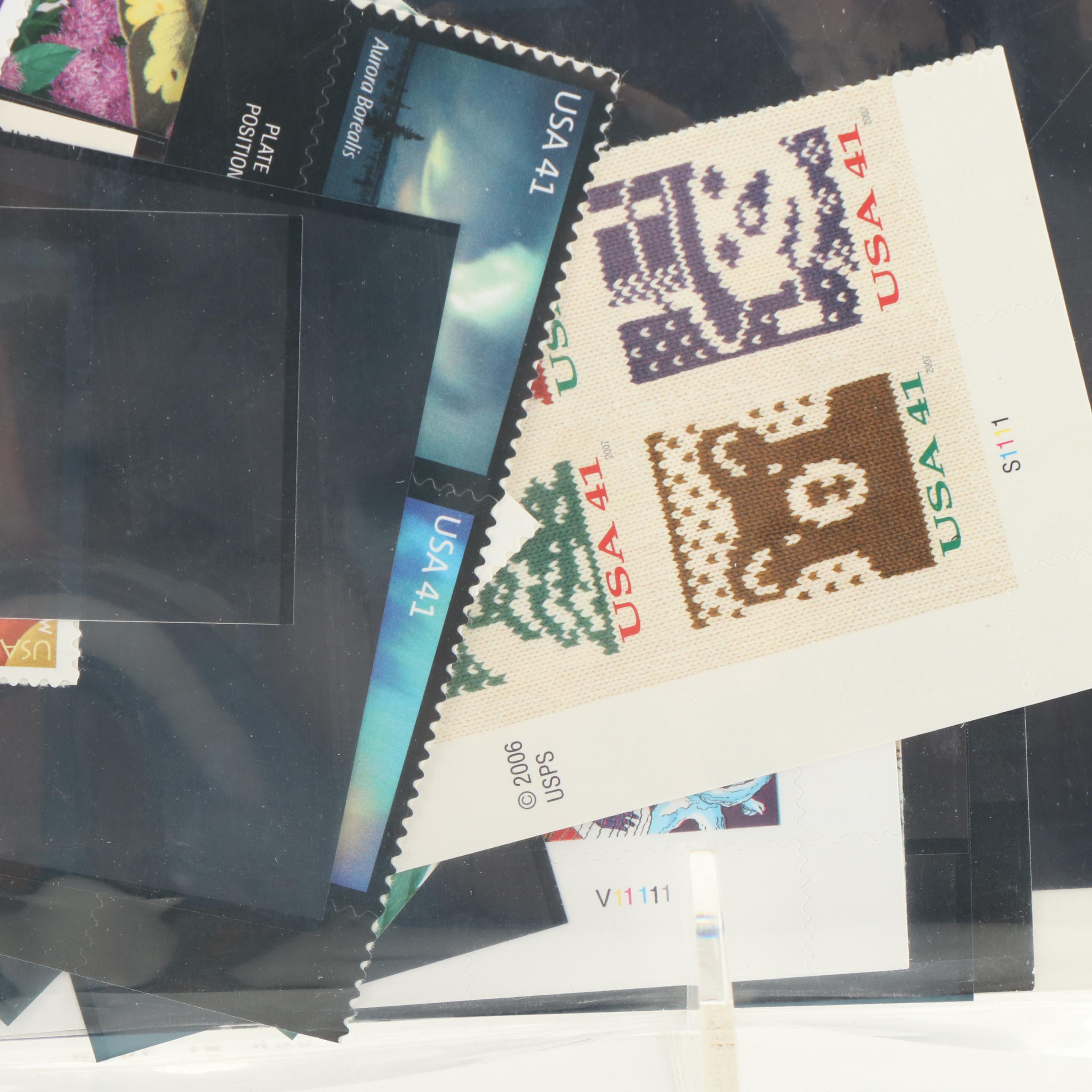 Four U.S.P.S. Commemorative Stamp Yearbooks