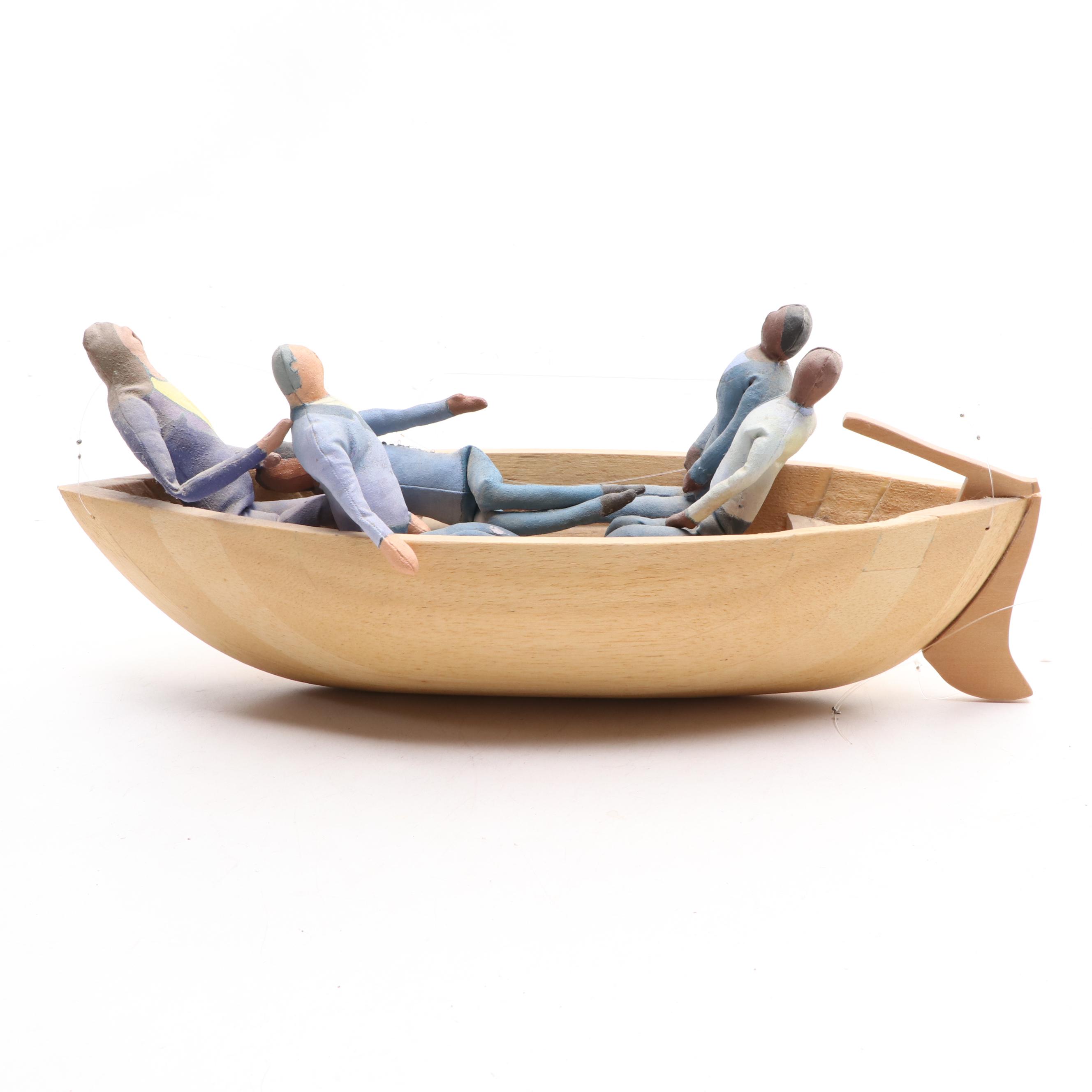 Folk Art People in Suits in a Wooden Boat