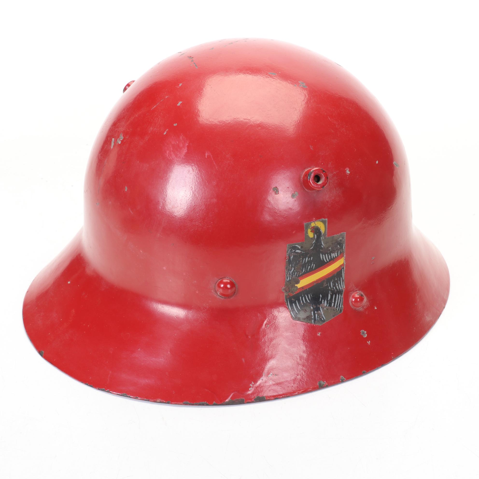 WWII Era Army and Civil Defense Helmets with Military Themed Comic Books