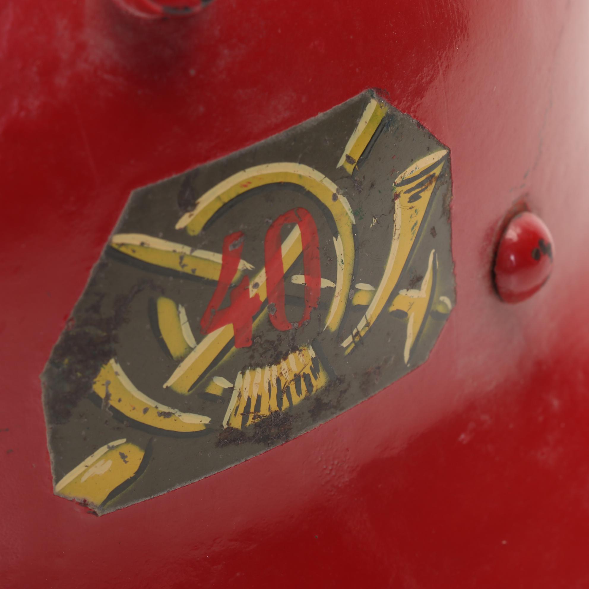 WWII Era Army and Civil Defense Helmets with Military Themed Comic Books