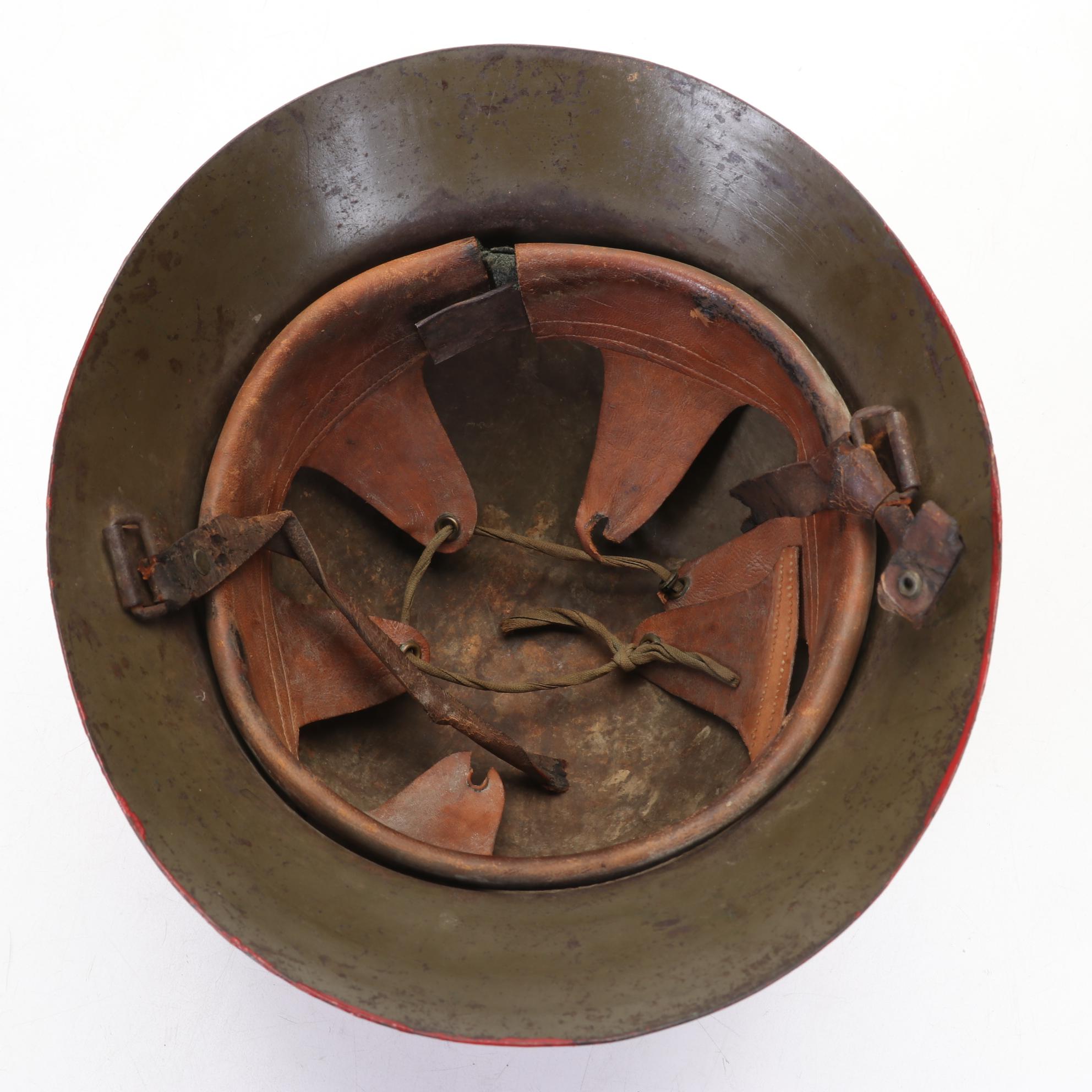 WWII Era Army and Civil Defense Helmets with Military Themed Comic Books