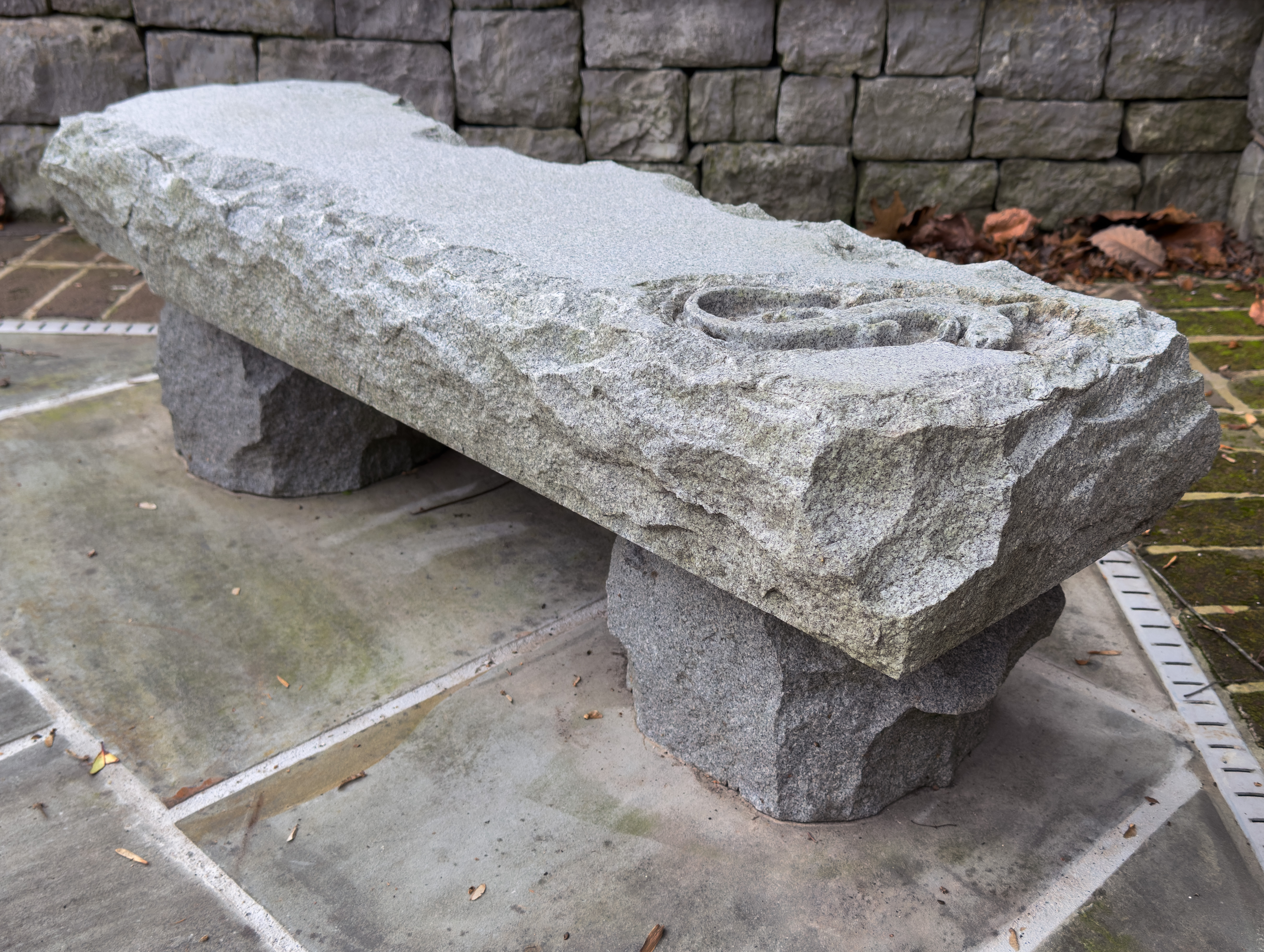 Carved Granite Garden Bench with Engraved Lizard