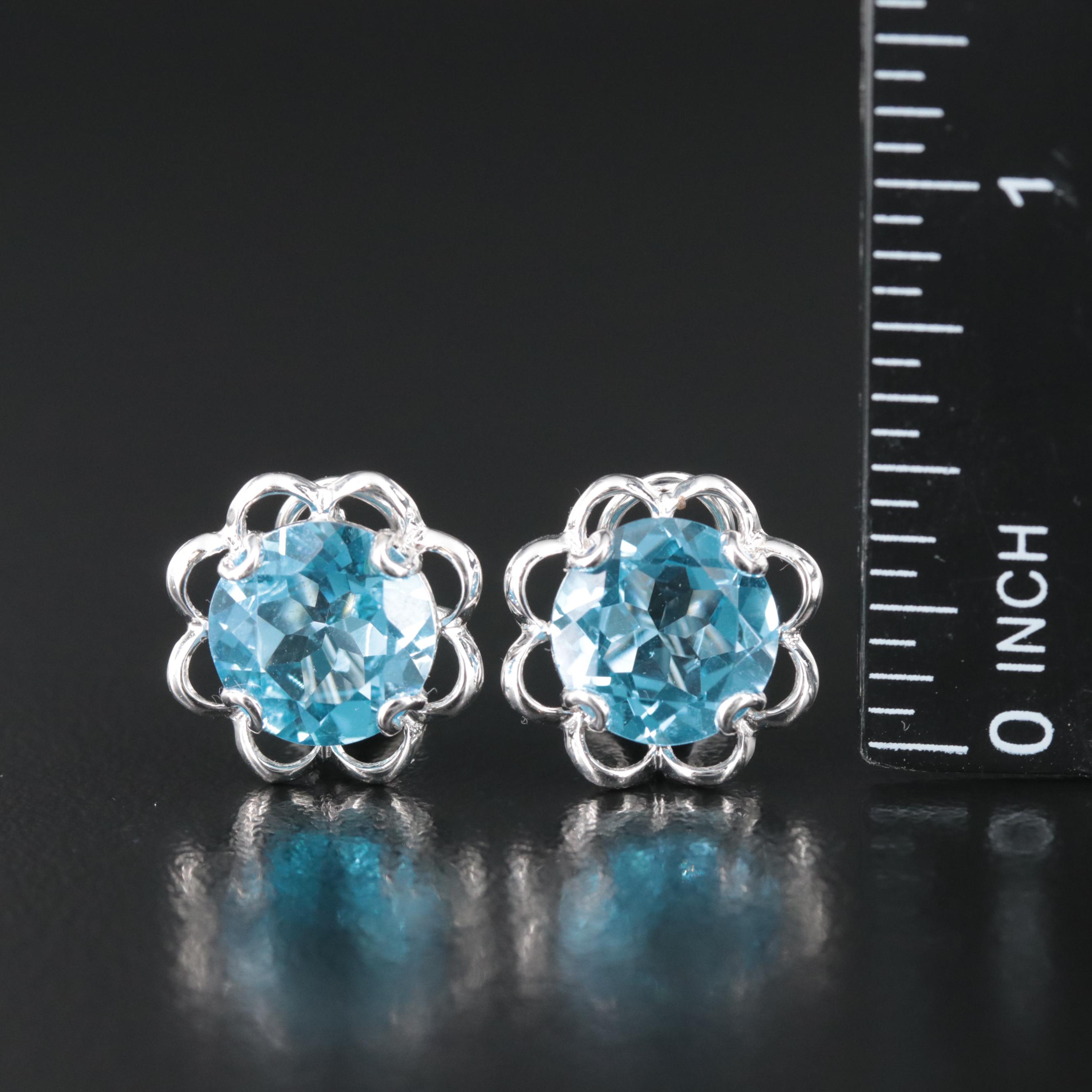 14K Swiss Blue Topaz Flower Earrings EBTH