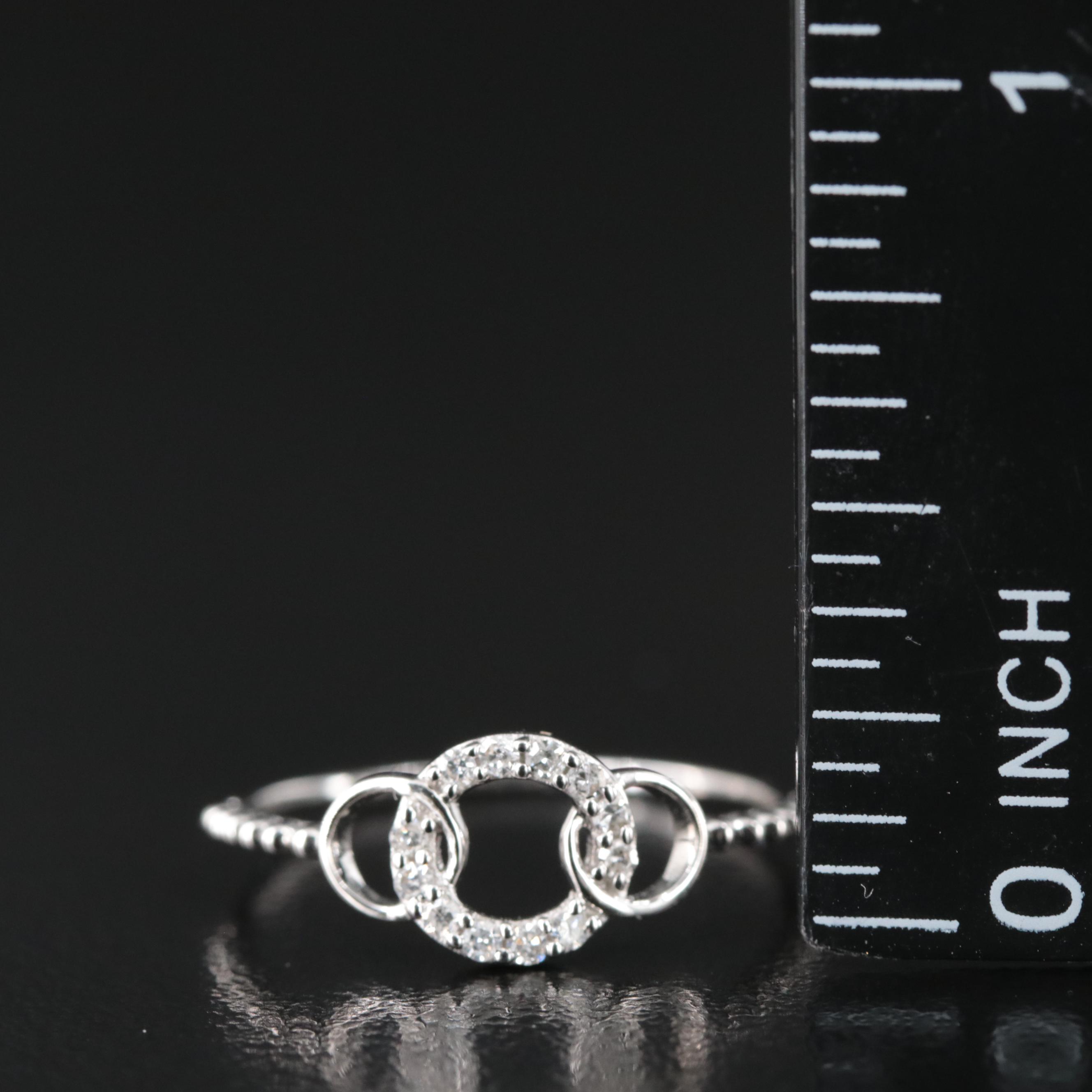 18K 0.10 CTW Diamond Ring