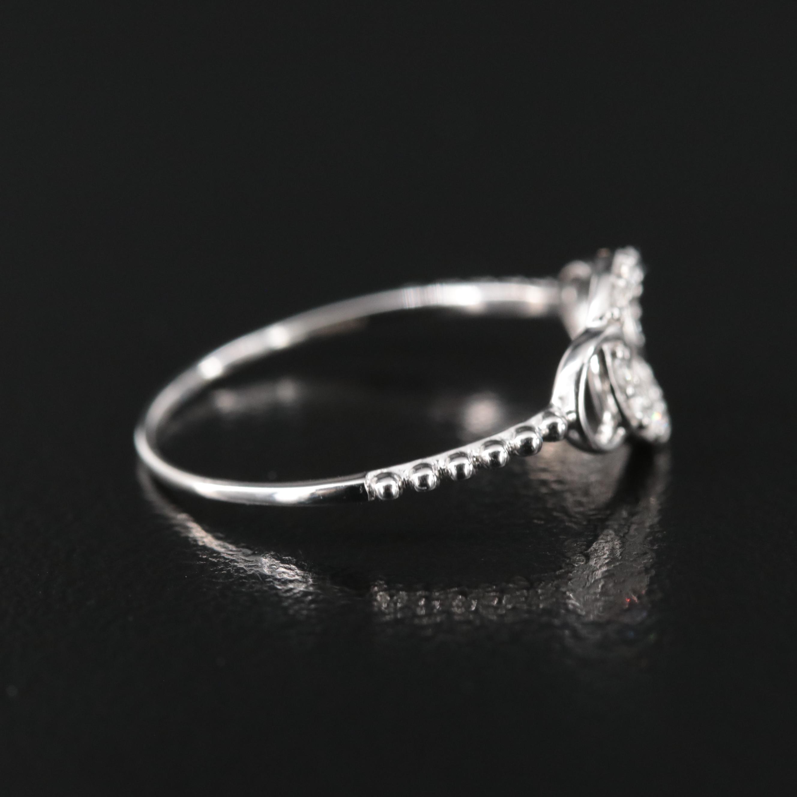 18K 0.10 CTW Diamond Ring