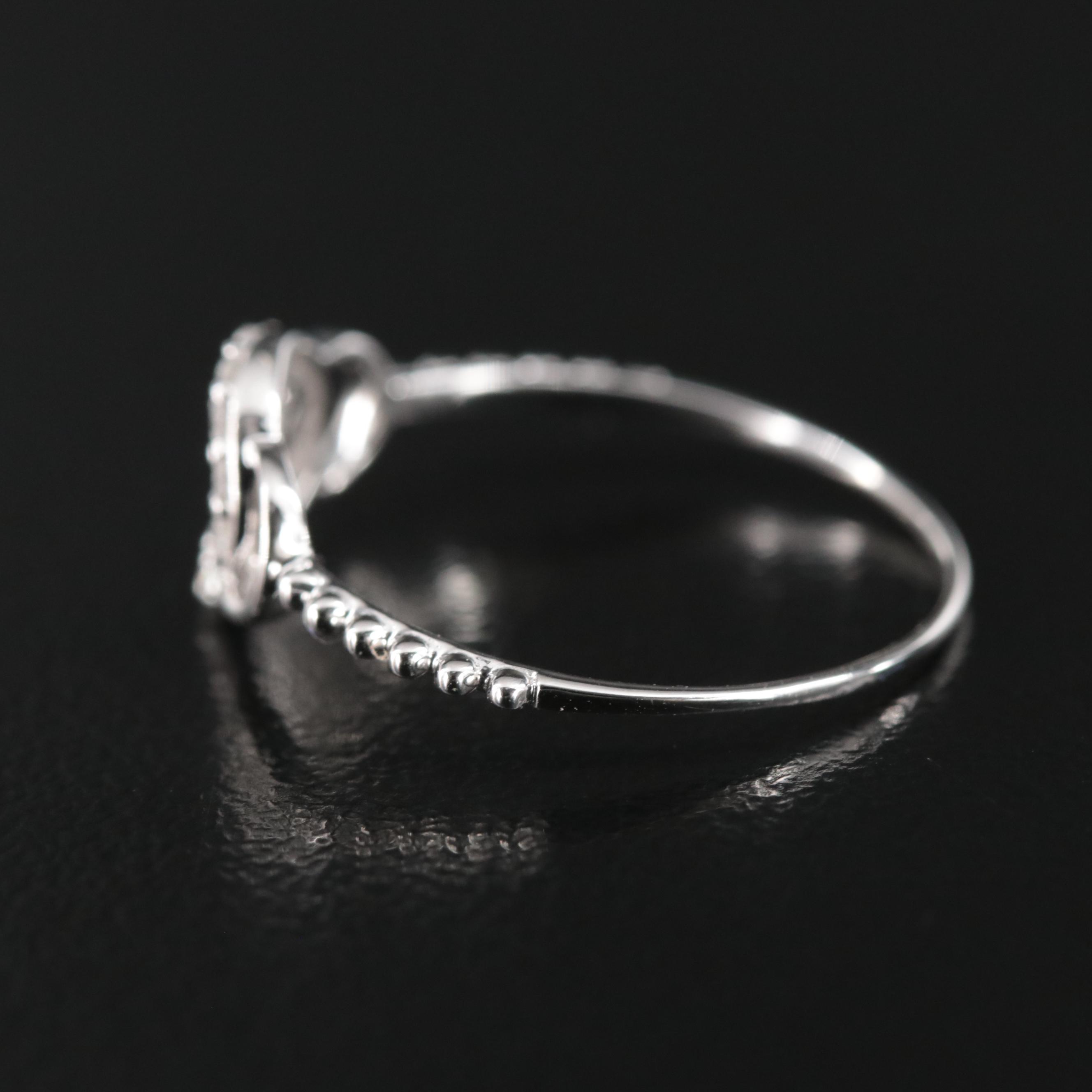 18K 0.10 CTW Diamond Ring