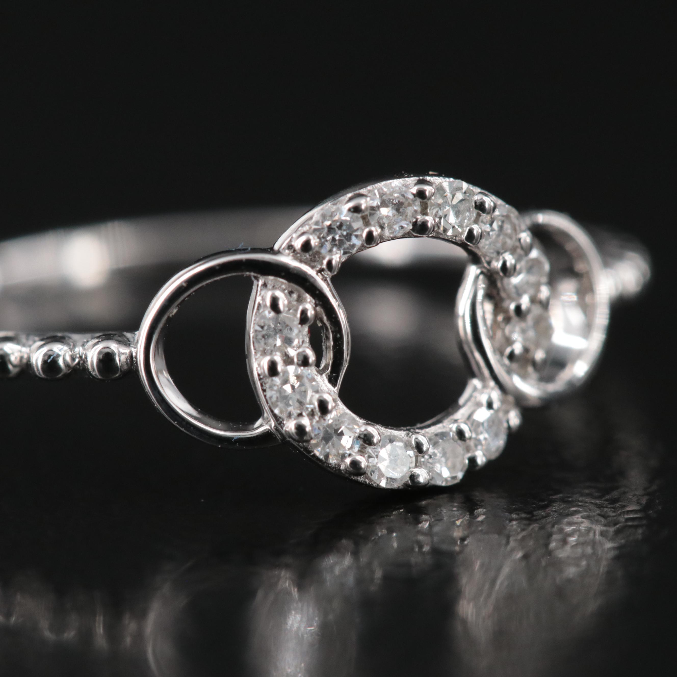 18K 0.10 CTW Diamond Ring