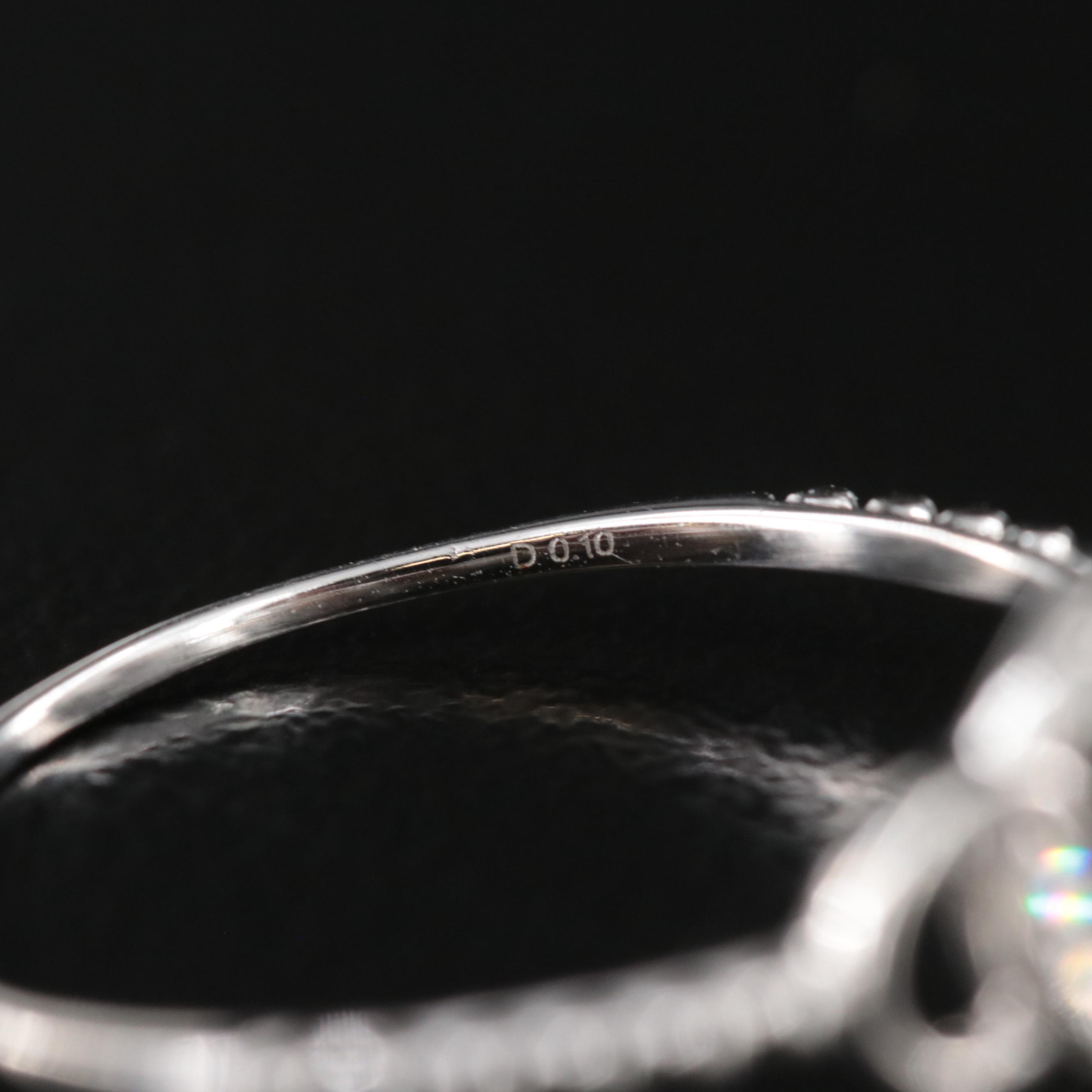 18K 0.10 CTW Diamond Ring