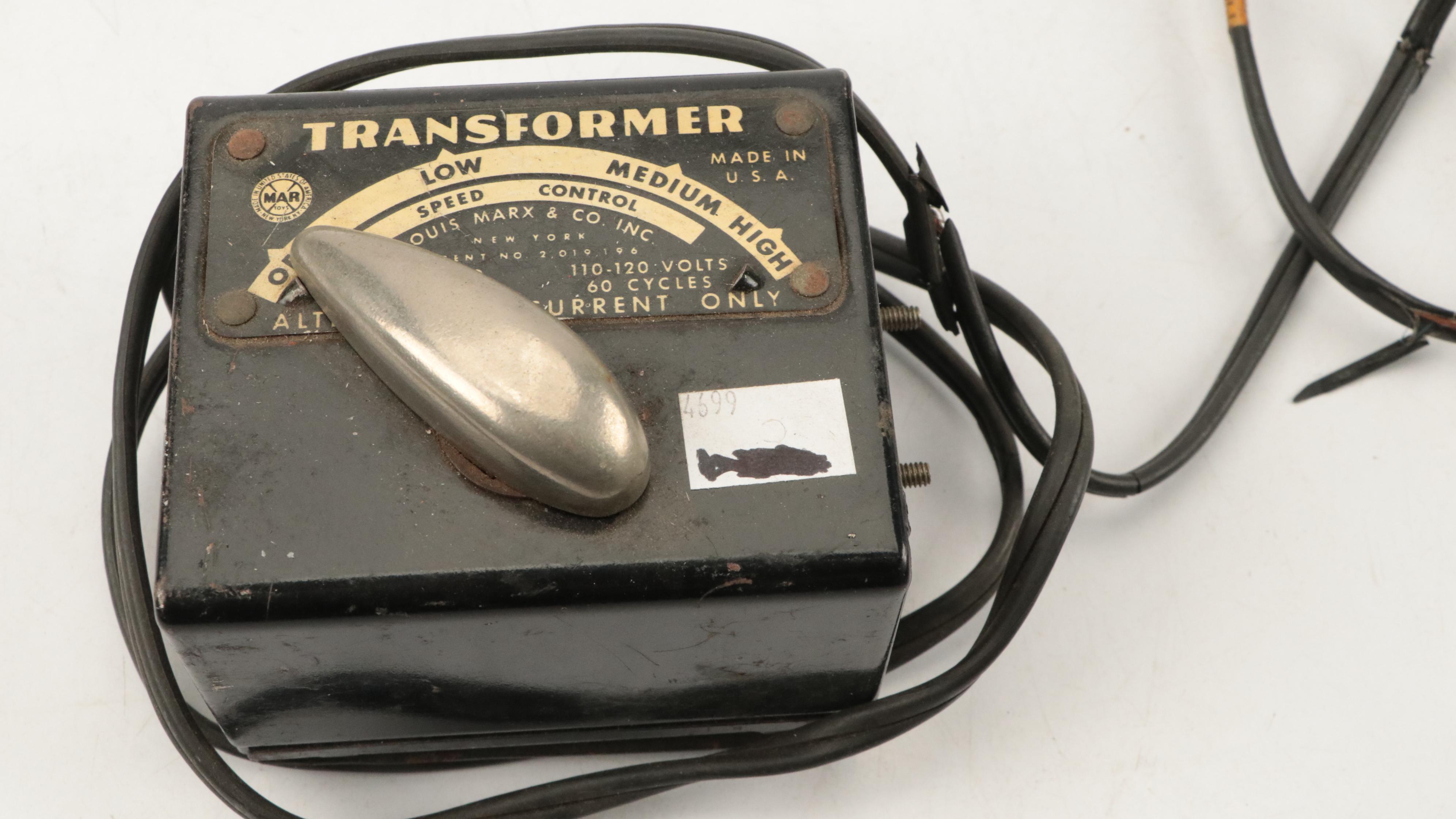 Louis Marx & Co. Train Transformer with O Scale and Other Train Cars