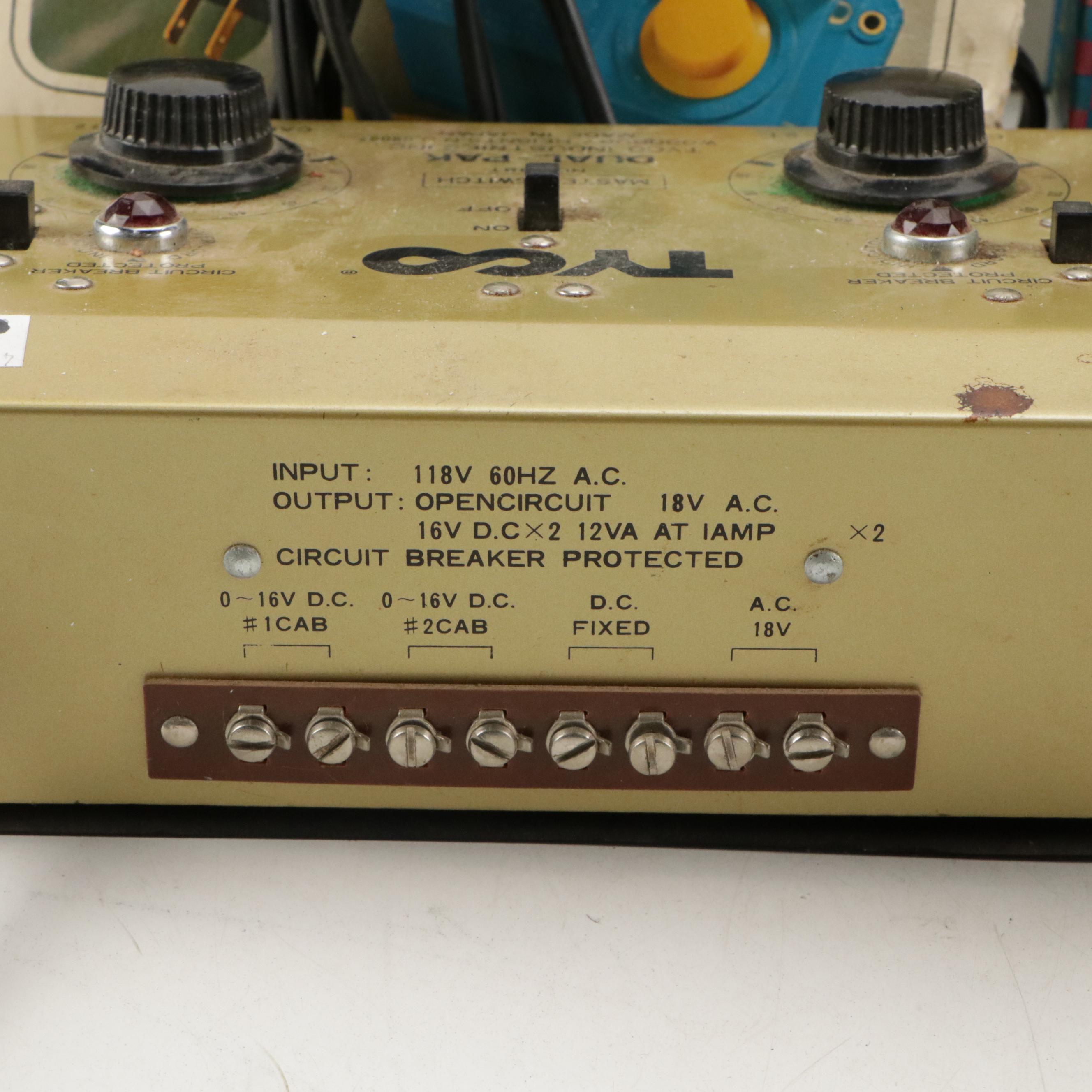 Tyco and Other Transformers with Assorted Train Cars, Tracks, and Accessories