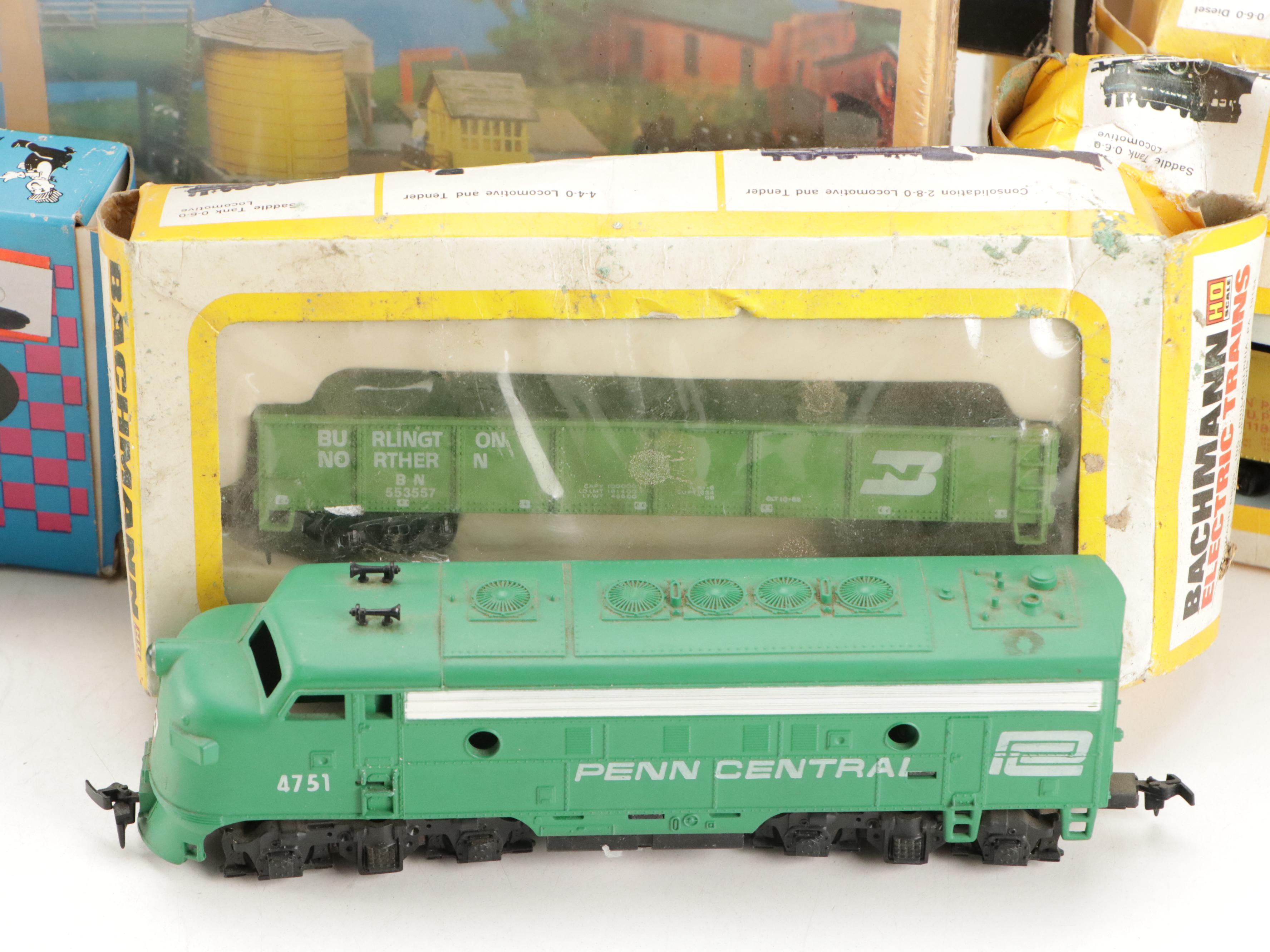 Tyco and Other Transformers with Assorted Train Cars, Tracks, and Accessories