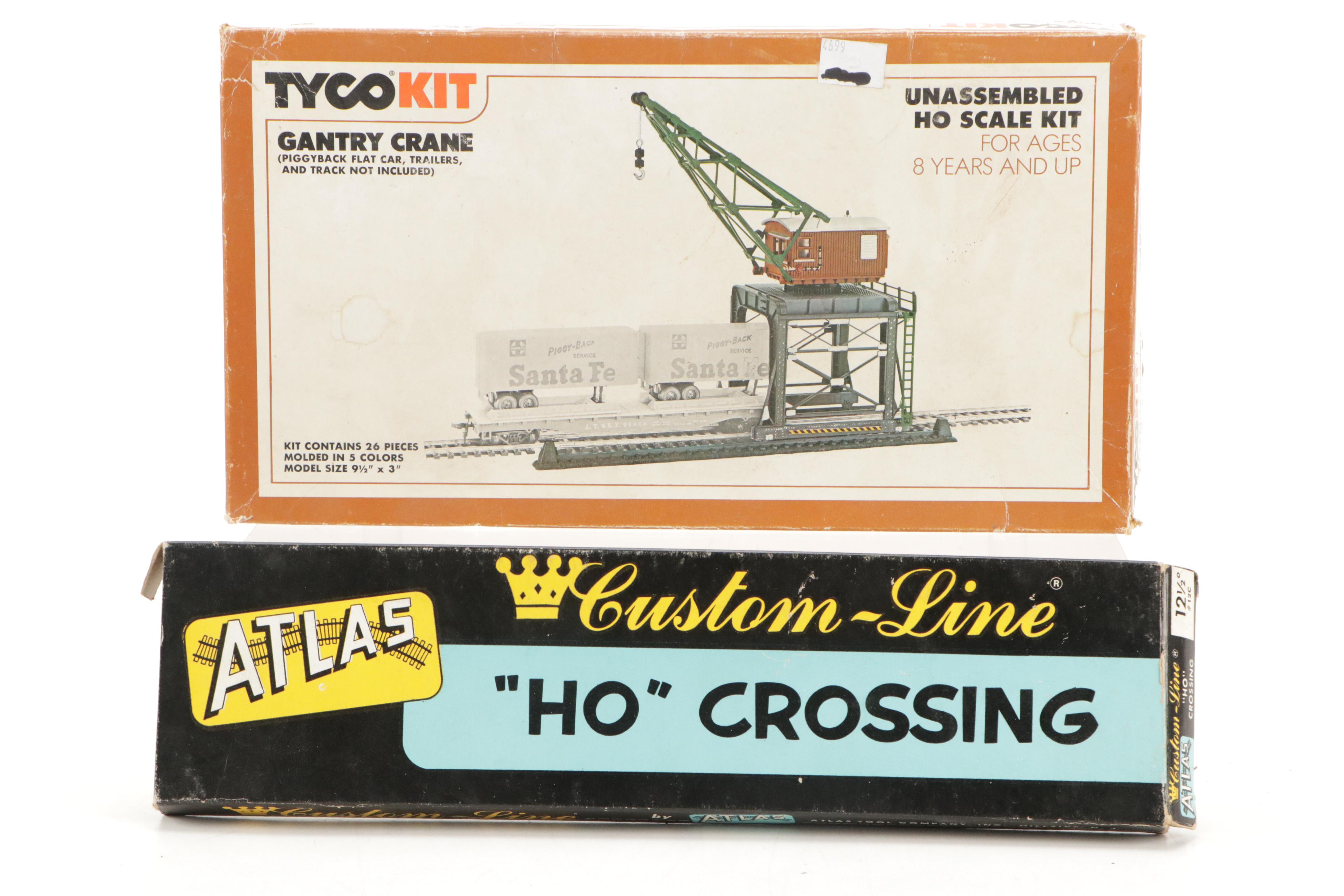 Tyco and Other Transformers with Assorted Train Cars, Tracks, and Accessories