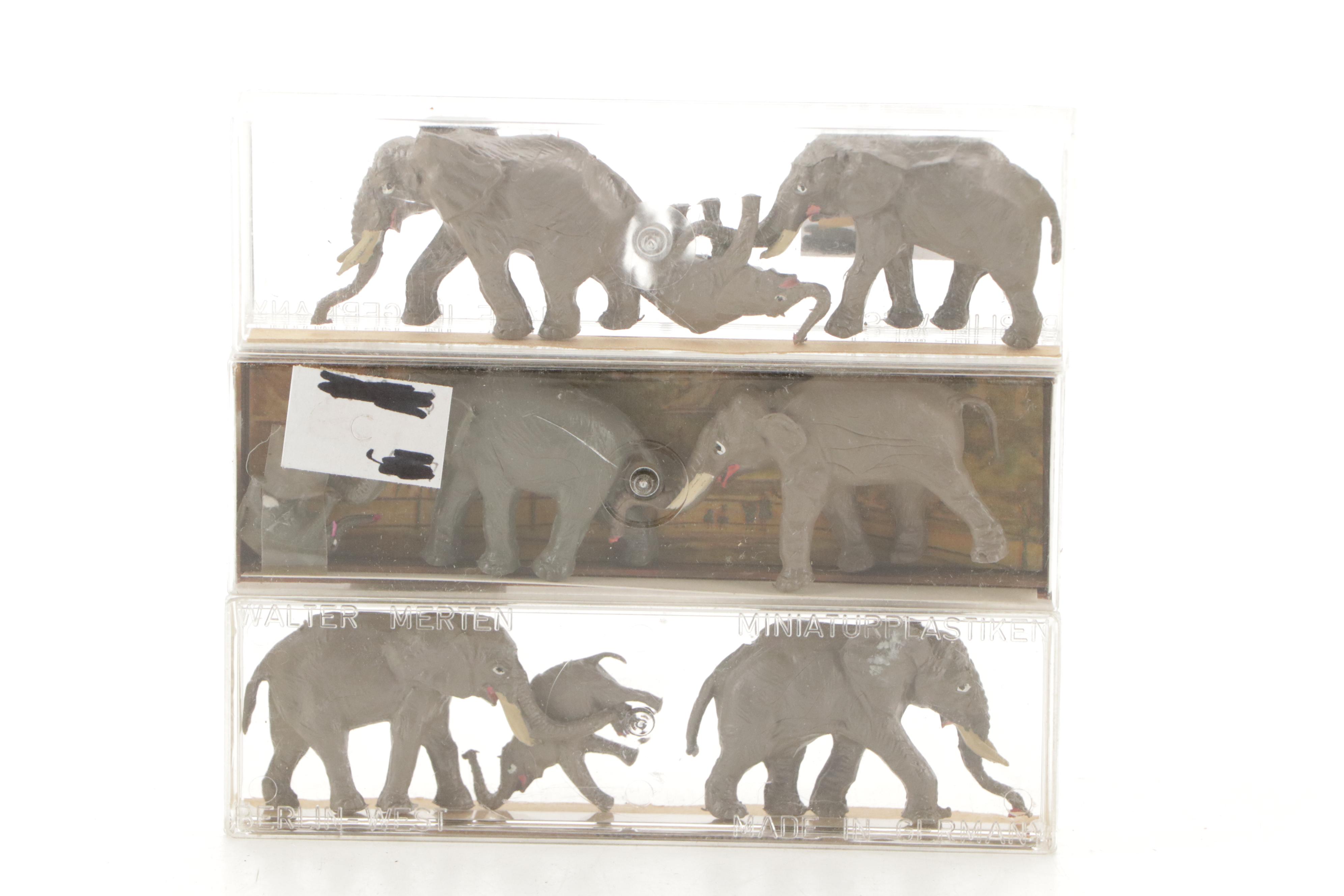 Tyco and Other Transformers with Assorted Train Cars, Tracks, and Accessories