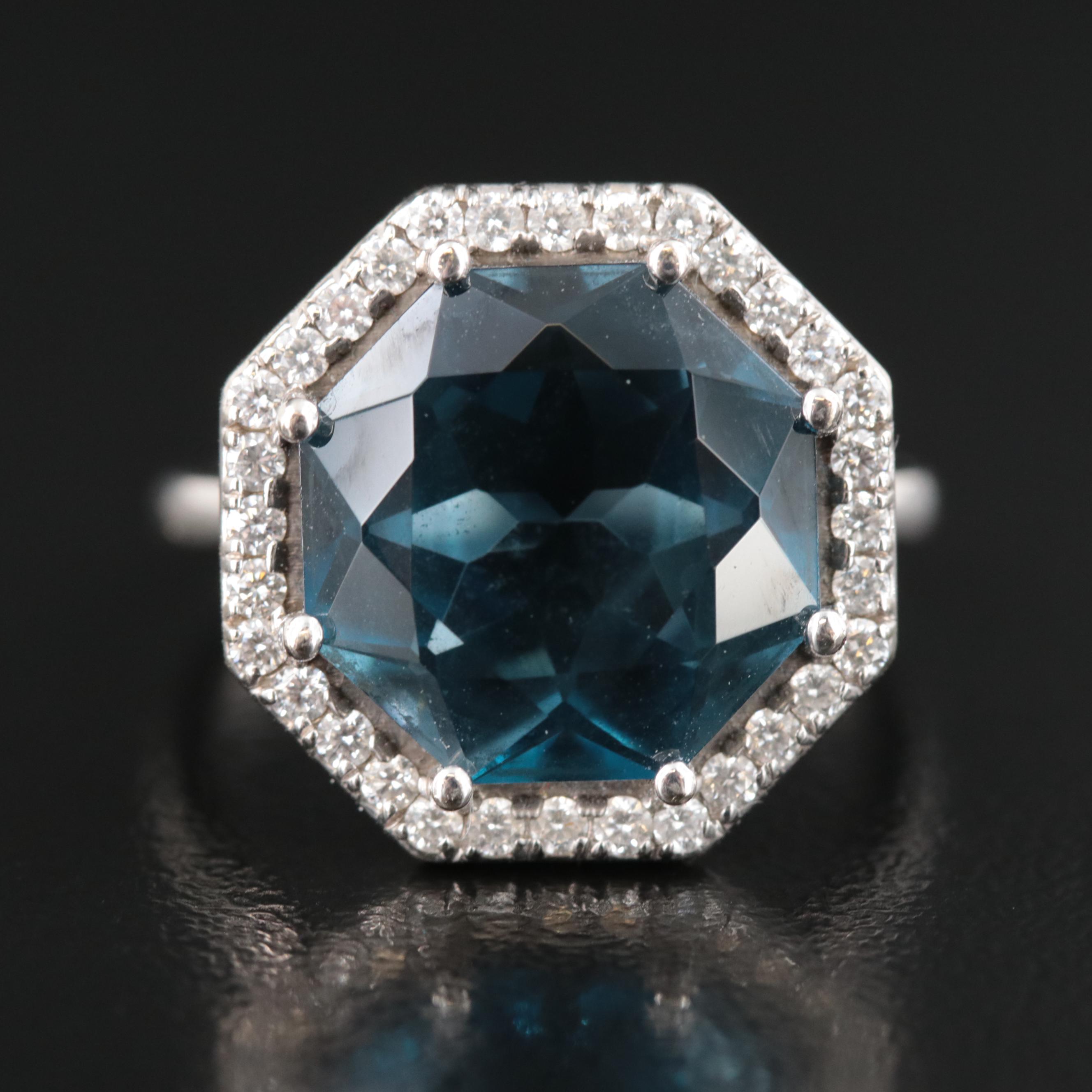 14K Blue Topaz and 0.32 CTW Diamond Ring