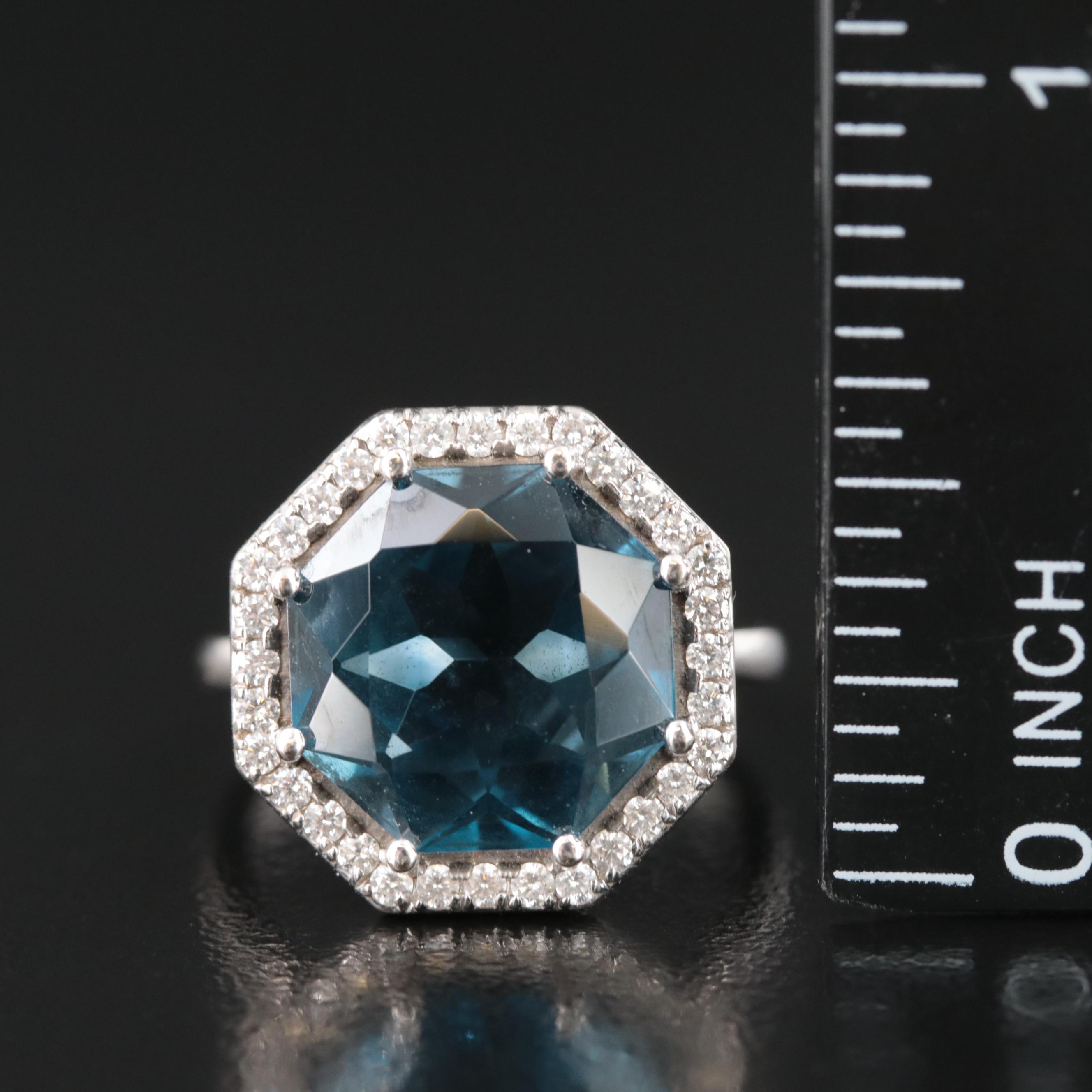 14K Blue Topaz and 0.32 CTW Diamond Ring