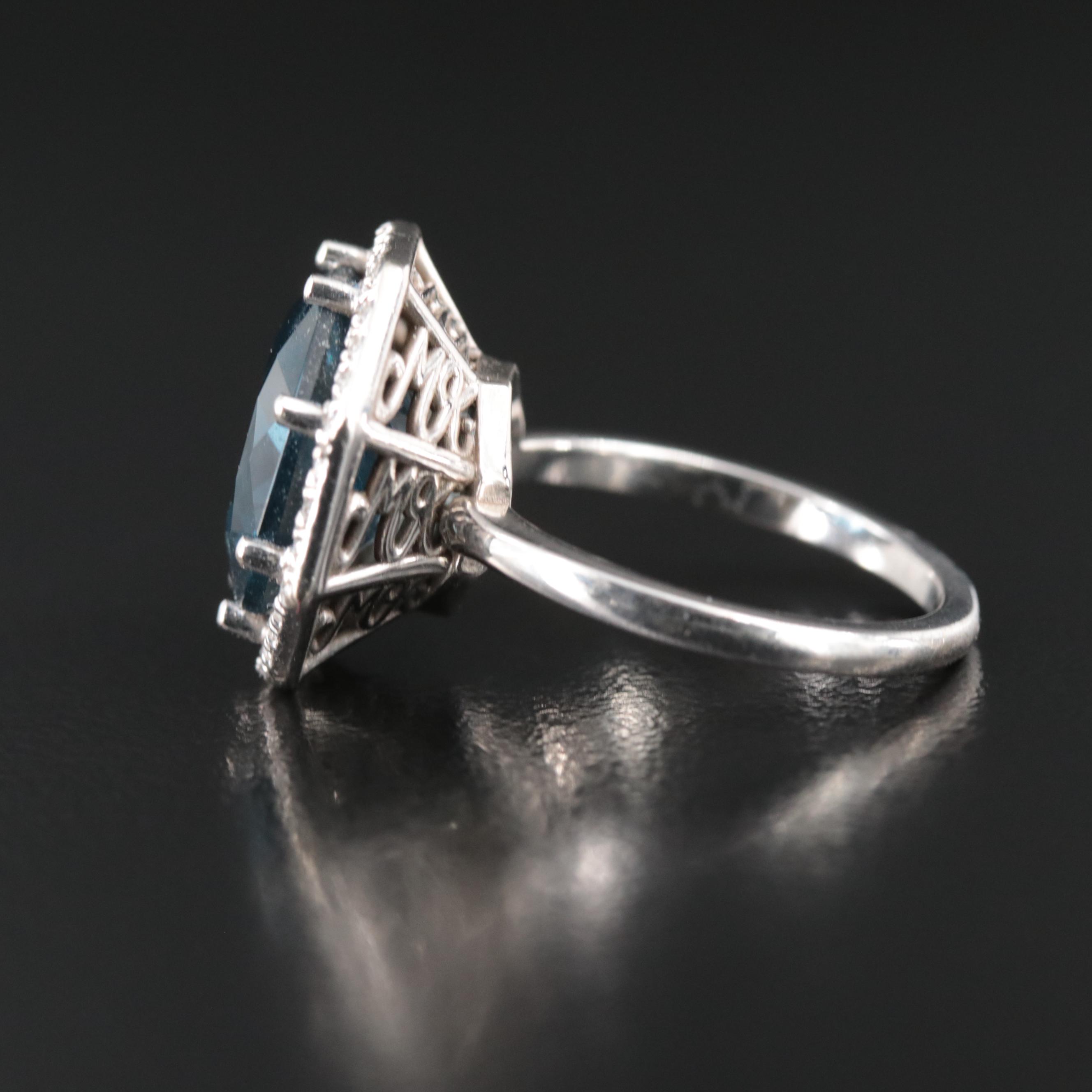 14K Blue Topaz and 0.32 CTW Diamond Ring