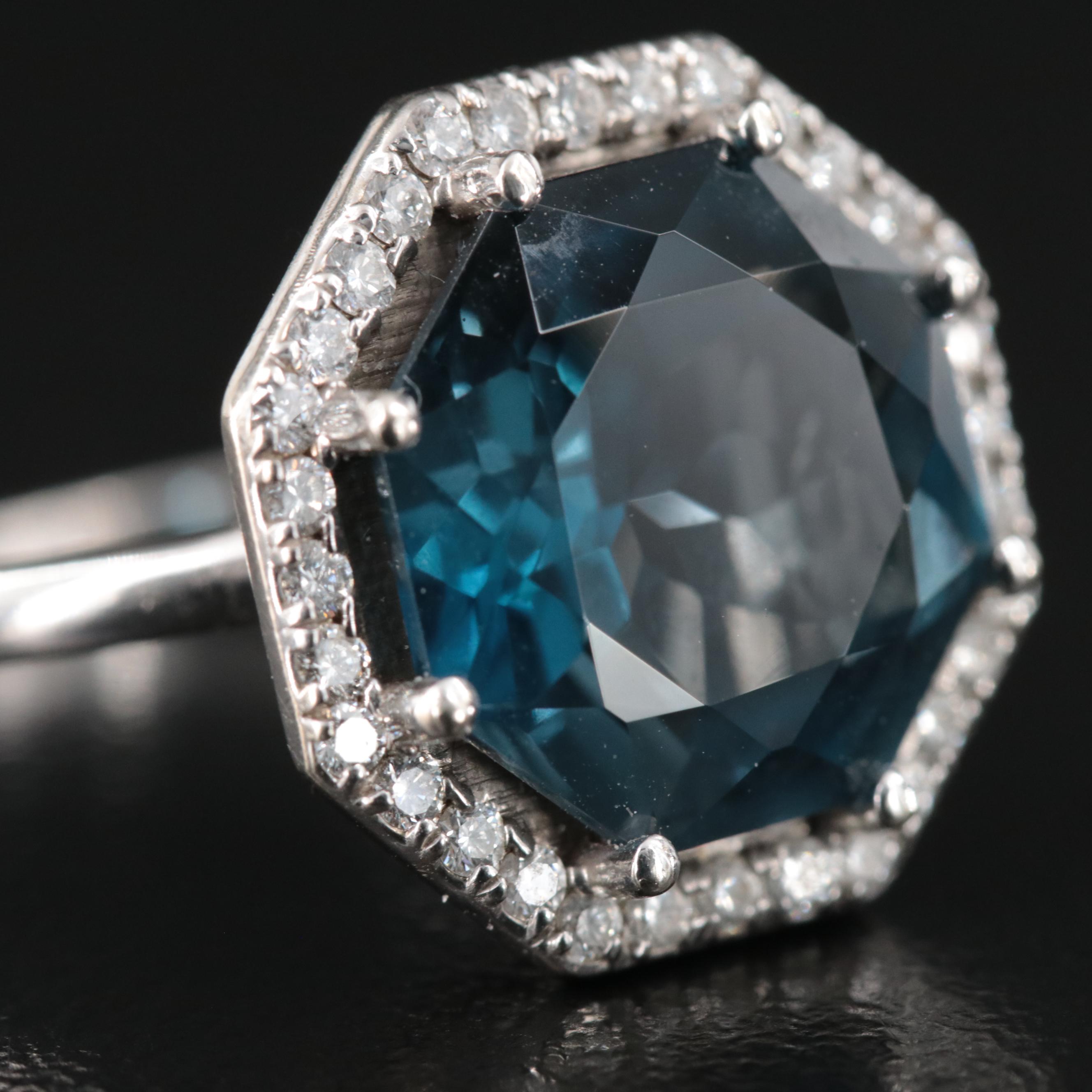 14K Blue Topaz and 0.32 CTW Diamond Ring