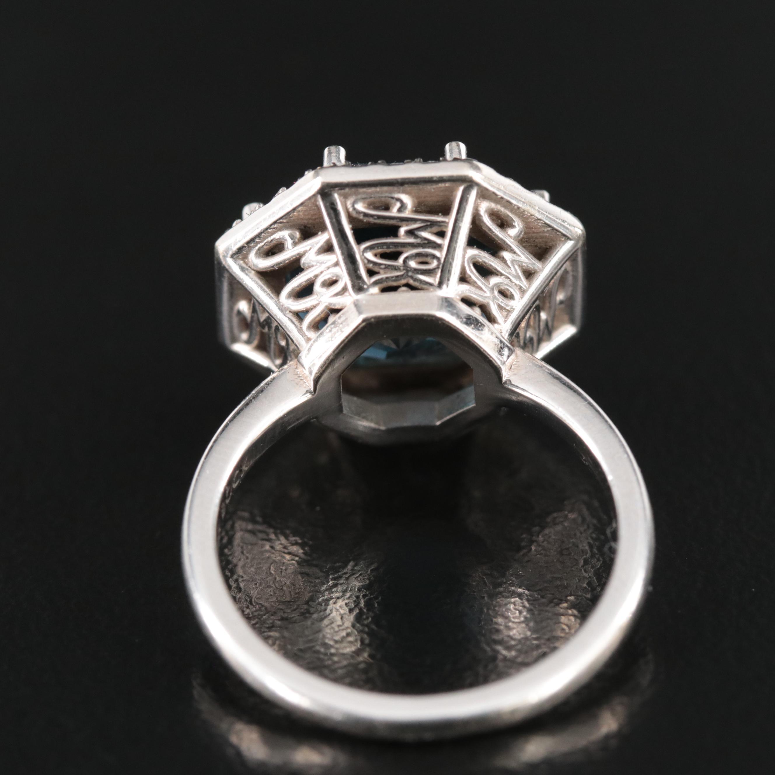 14K Blue Topaz and 0.32 CTW Diamond Ring