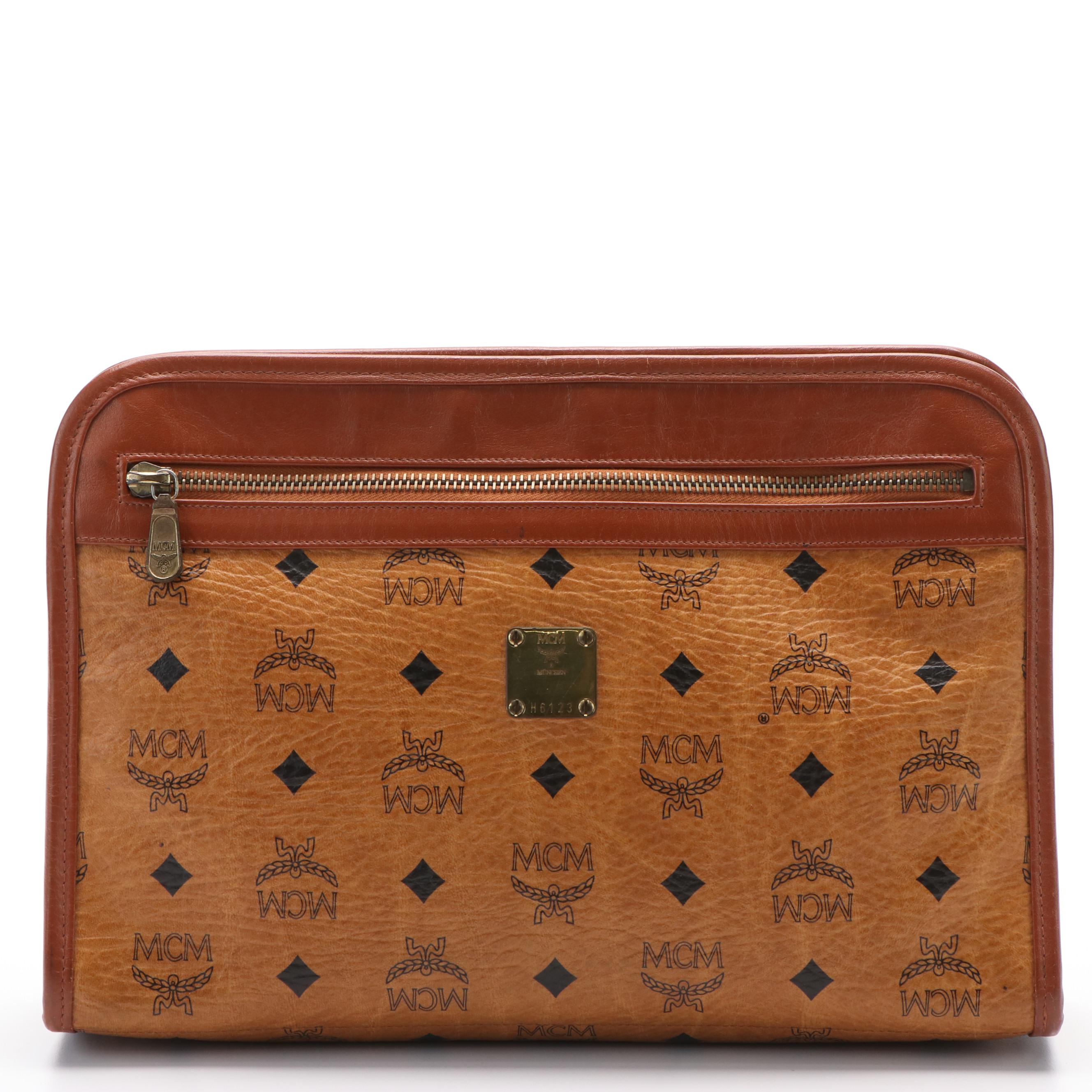 MCM Clutch Bag in Cognac Visetos Canvas and Leather