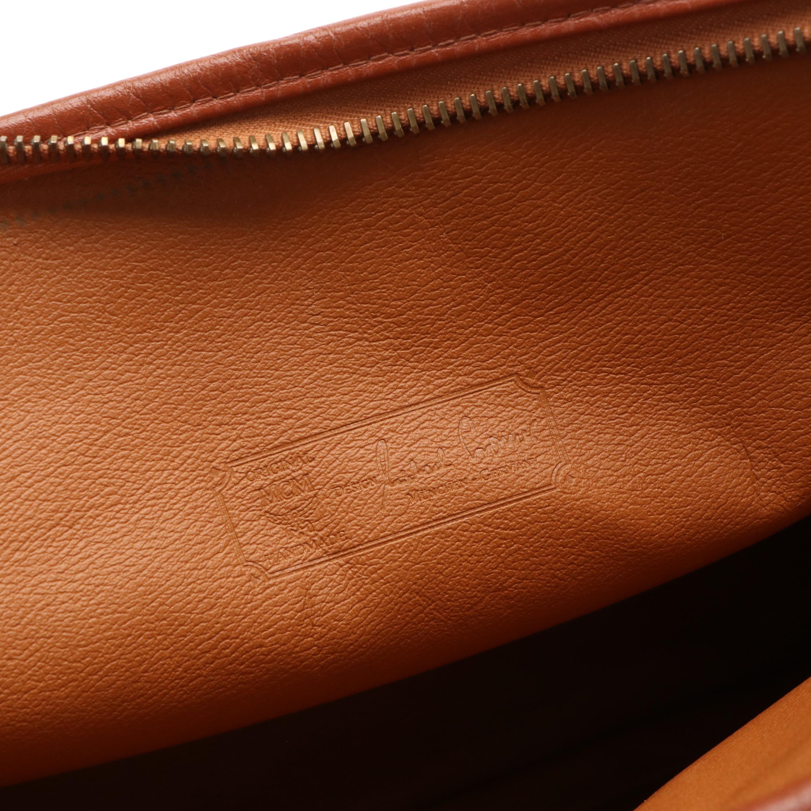 MCM Clutch Bag in Cognac Visetos Canvas and Leather