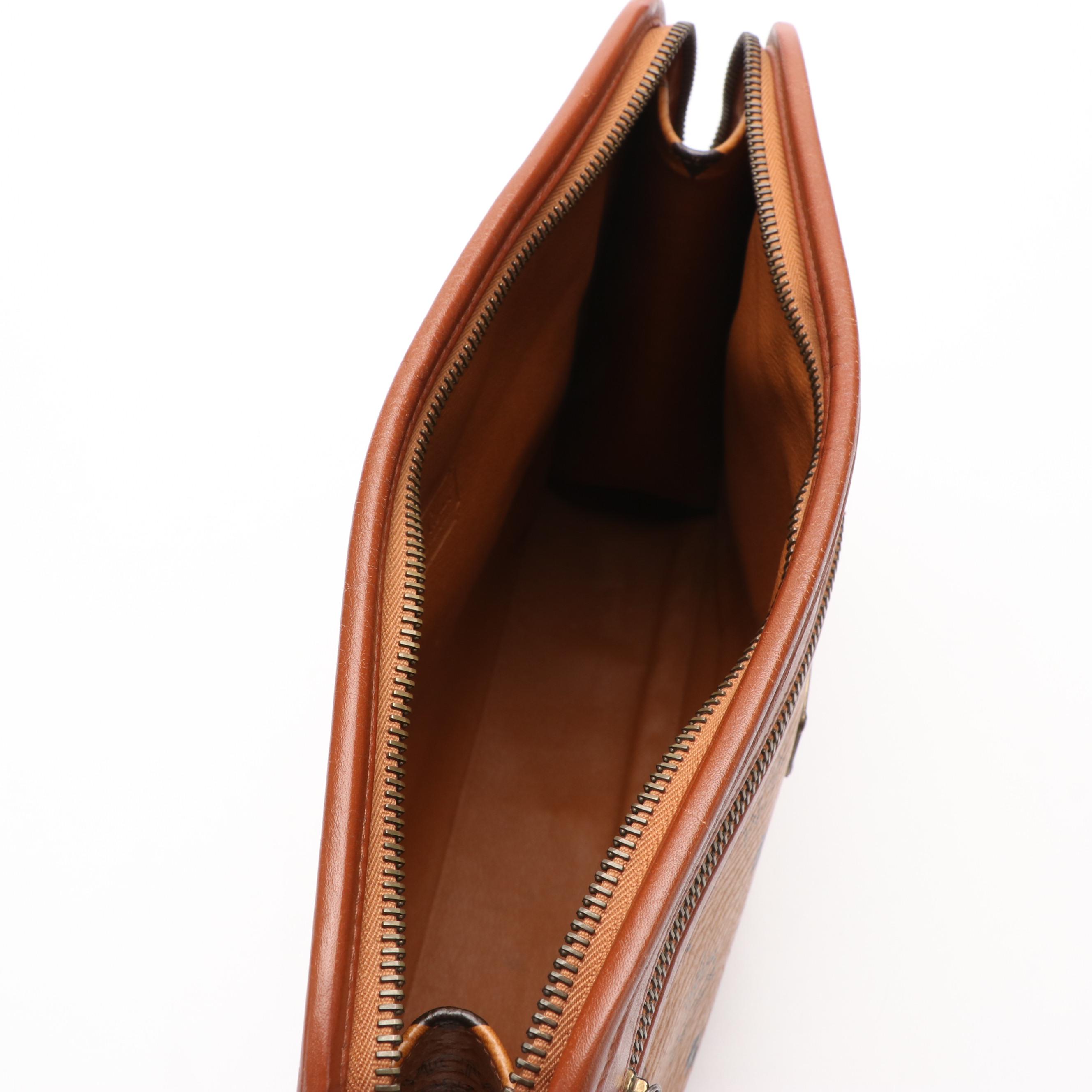 MCM Clutch Bag in Cognac Visetos Canvas and Leather