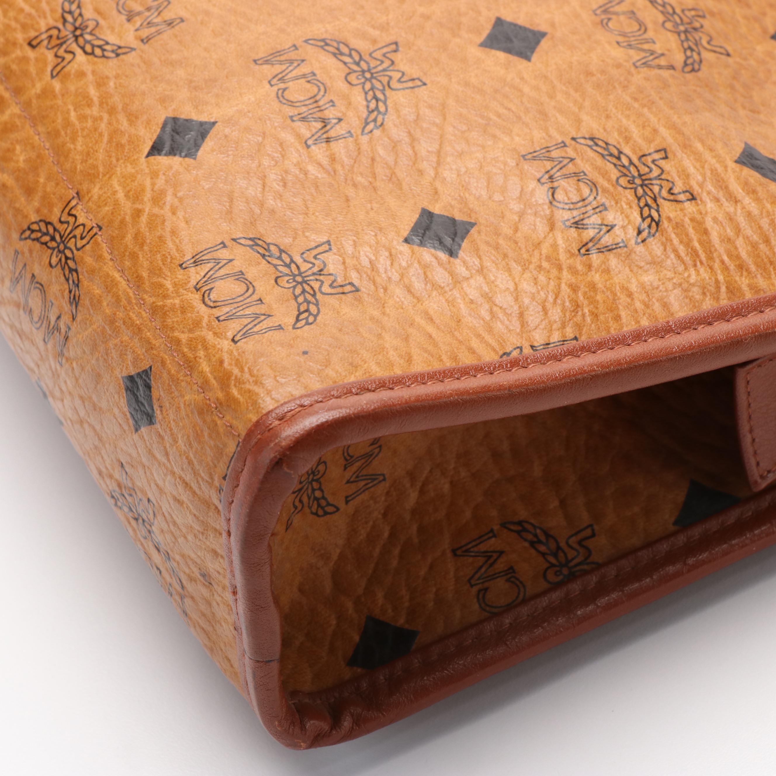 MCM Clutch Bag in Cognac Visetos Canvas and Leather